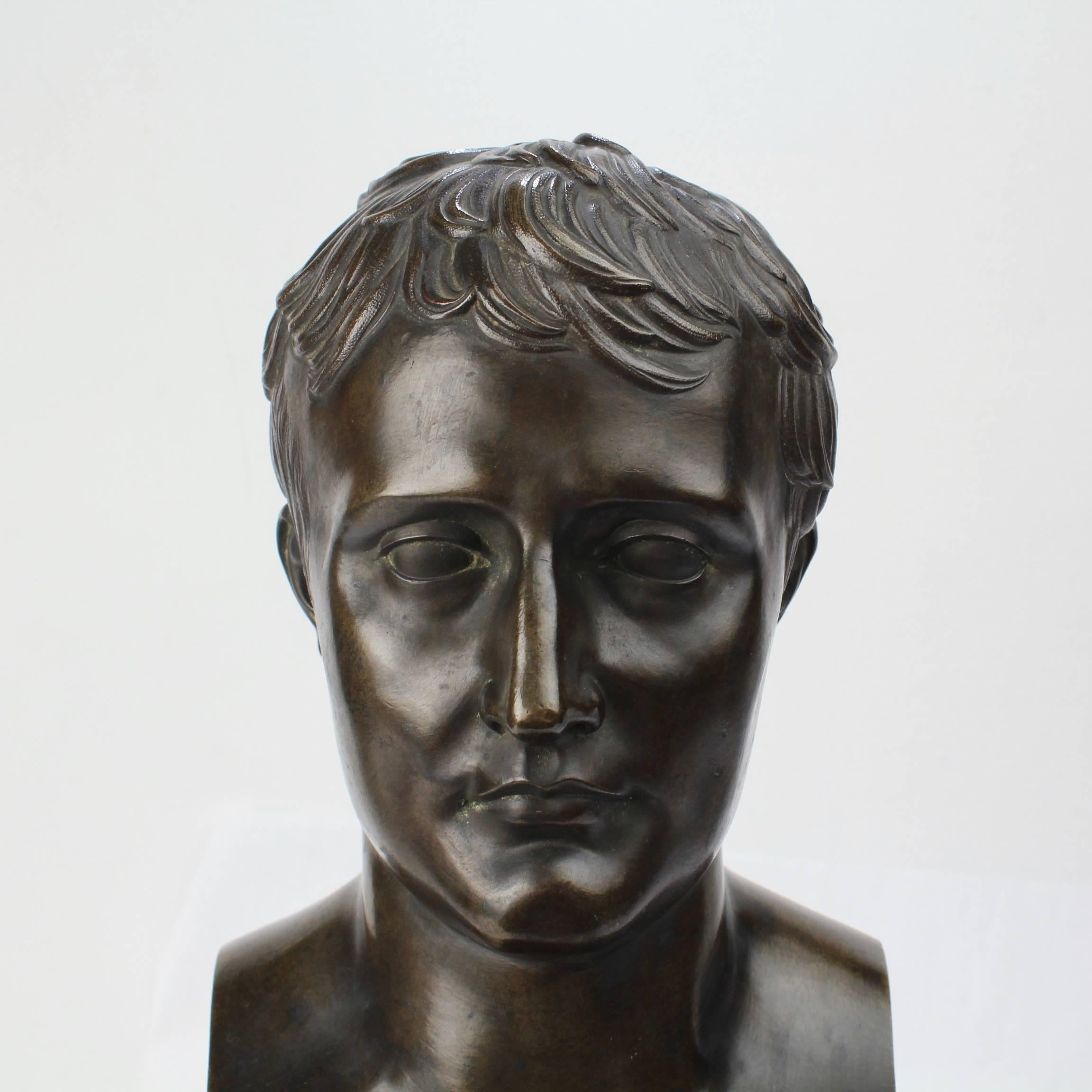 A fine bust of Napoleon Bonaparte after Antoine-Denis Chaudet.

Mounted on a fine mahogany plinth bearing a gilt regal rondel on its front.

Stamped to the reverse with no. 426.

Height: circa 16 in.

Items purchased from David Sterner