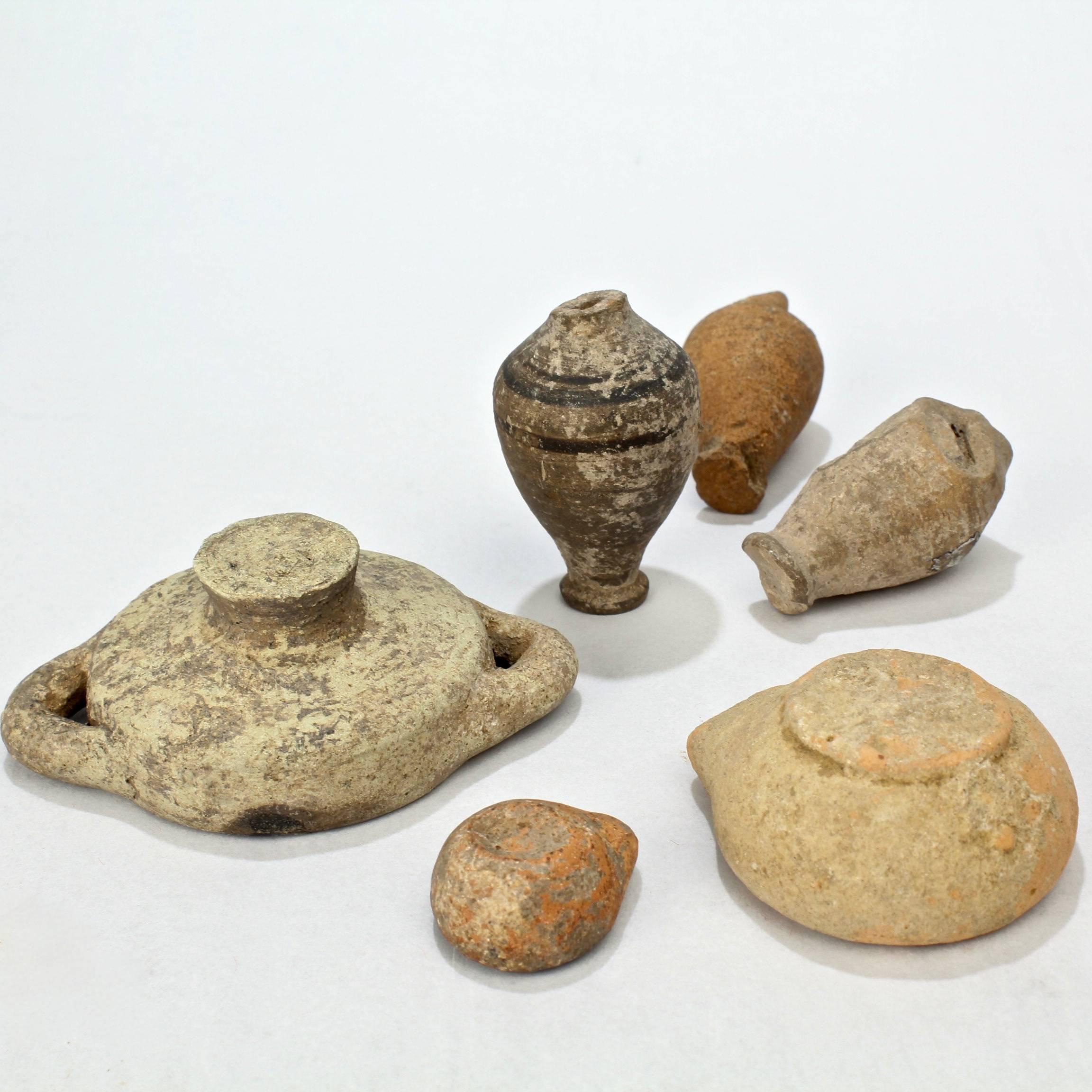 Greco Roman Group of Six Possibly Ancient Terracotta Oil Lamps, Small Vases and Vessels