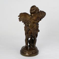"Enfant au Coq" a Bronze Sculpture of a Child and Cock after Cecioni Adriano