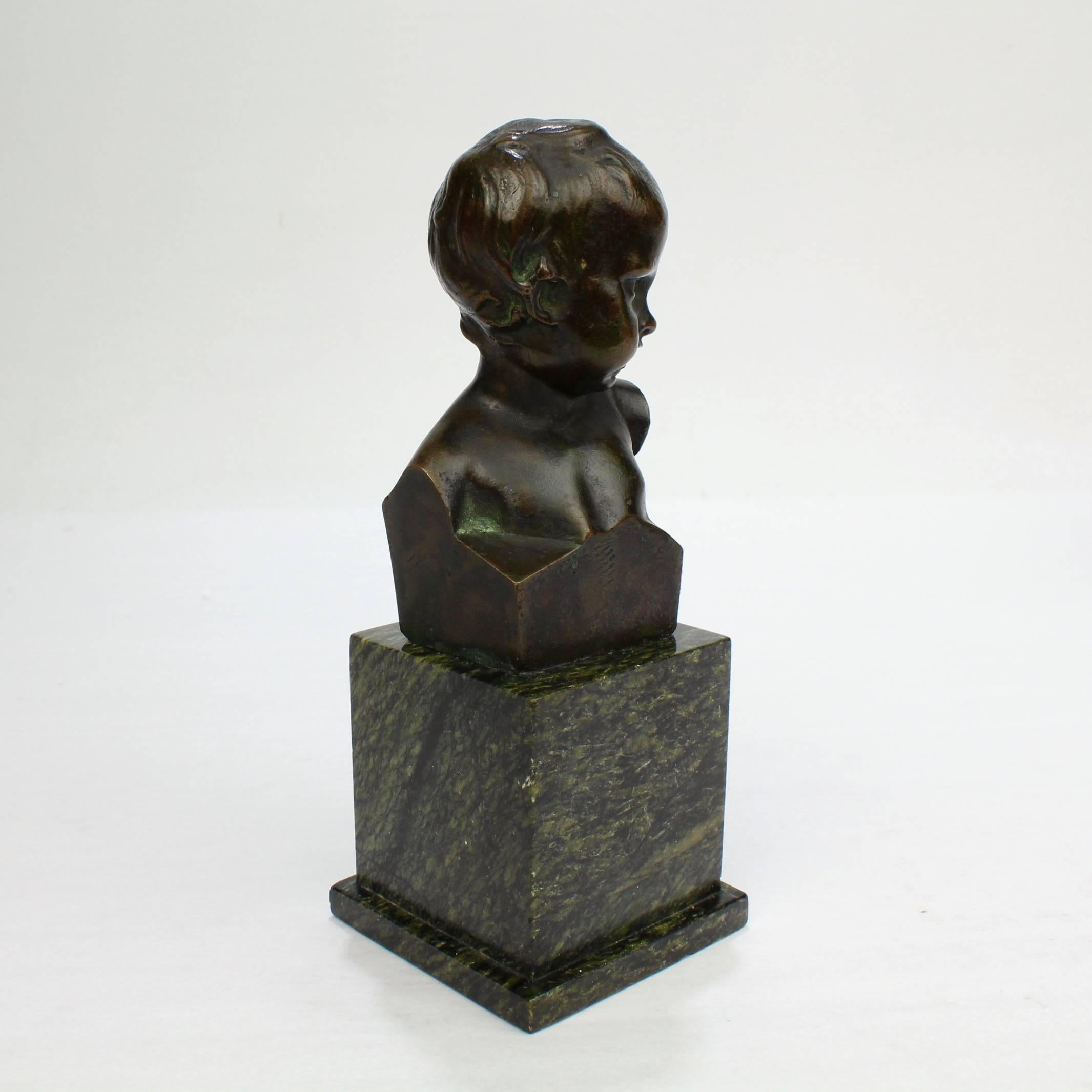 Small Antique Bronze Bust of a Child after Jean-Antoine Houdon In Good Condition For Sale In Philadelphia, PA