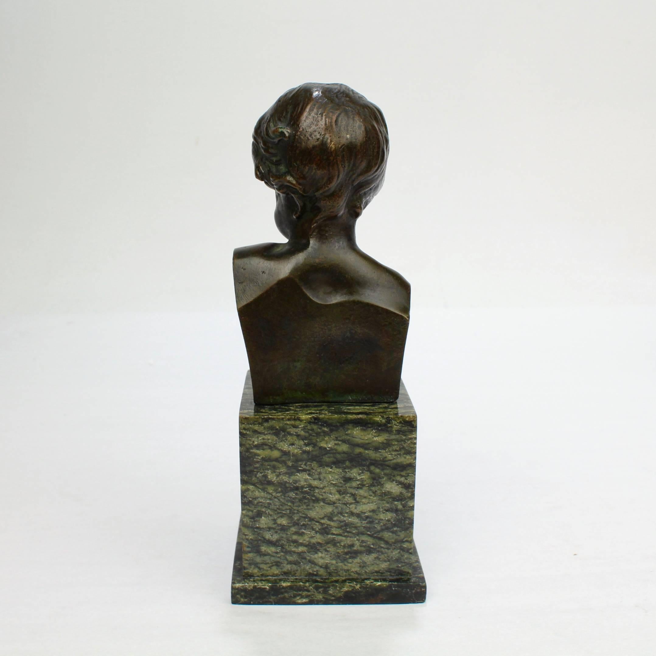 20th Century Small Antique Bronze Bust of a Child after Jean-Antoine Houdon For Sale