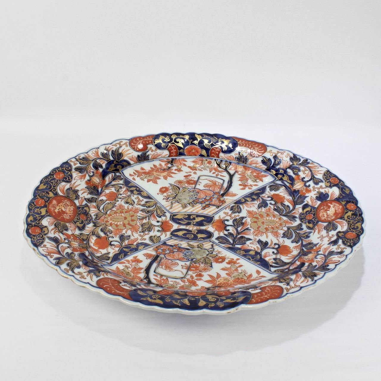 A fine large oval Japanese Imari Porcelain platter or tray. 

In traditional blue and red decoration with gold highlights throughout. 

Width: circa 14 7/8 in. 

Items purchased from David Sterner antiques must delight you. Purchases may be