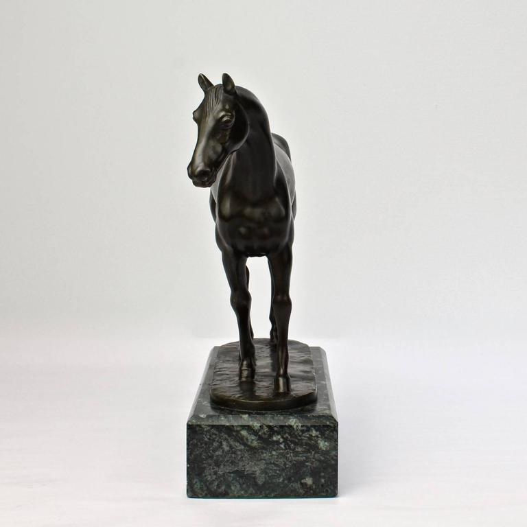 Vintage German Bronze Sculpture of a Race Horse, Early ... 20th century wooden sculpture depicting female character.