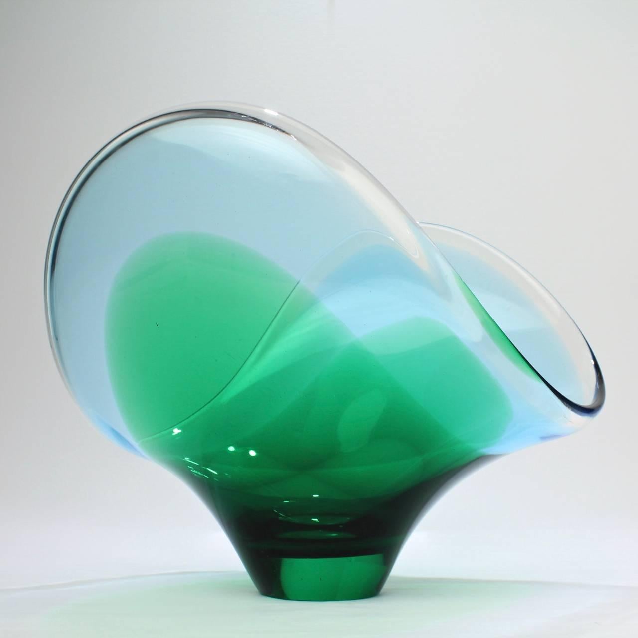 A good Sommerso Murano art glass bowl.

With and organic form and blue and green colors.

Width: ca. 10 1/2 in.

Items purchased from David Sterner Antiques must delight you. Purchases may be returned for any reason for a period of 7 days.

.