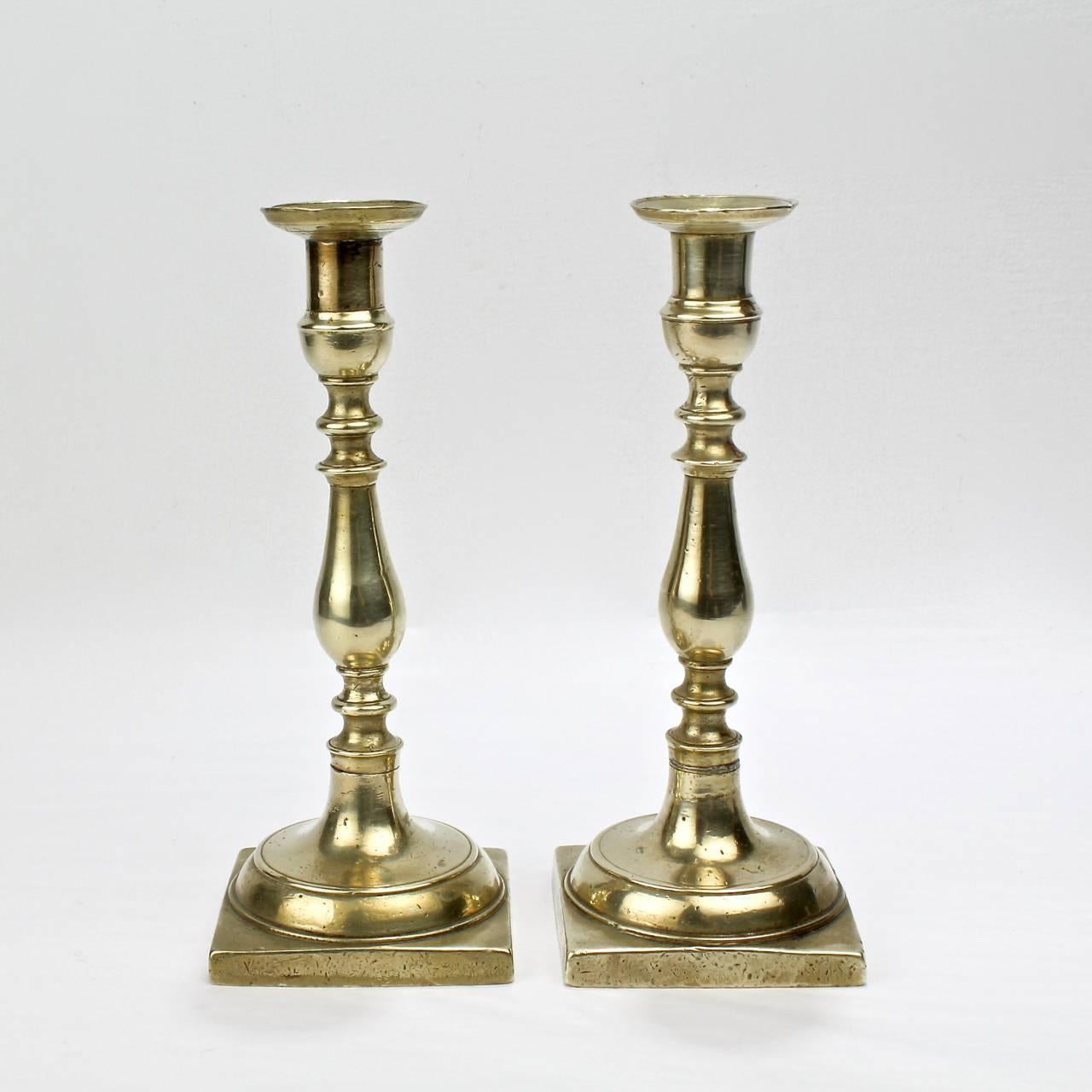 European Pair of Early 19th Century Continental Brass Candlesticks For Sale