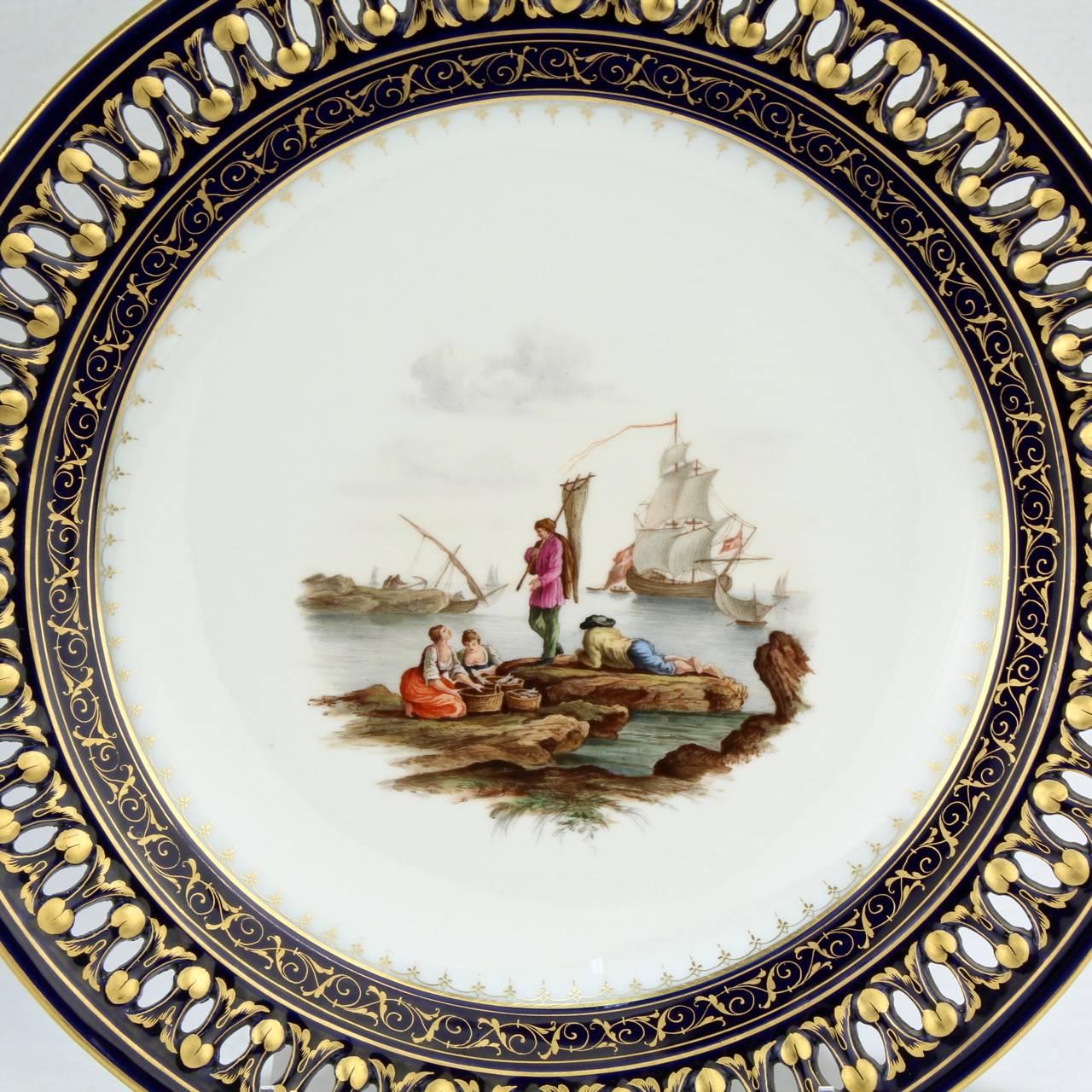 Hand-Painted Pair of Antique Meissen Porcelain Reticulated Cabinet Plates with Cobalt Borders