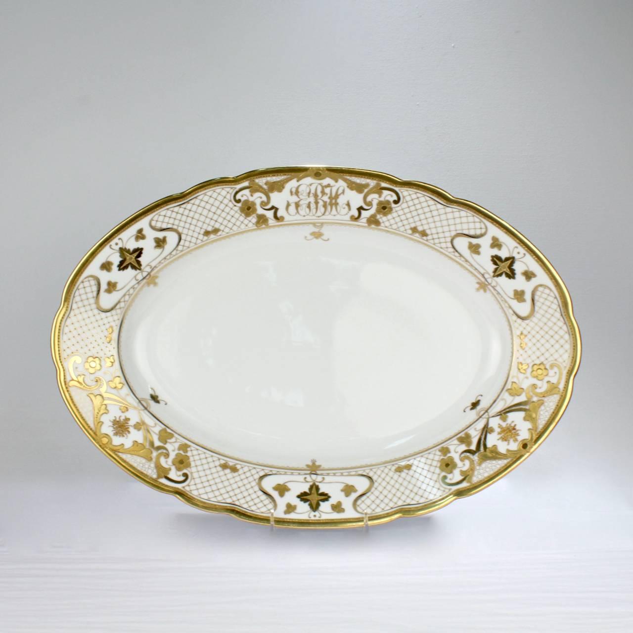 A fine and large antique Dresden porcelain serving platter by Ambrosius Lamm.

With raised, jeweled, and two-tone gilding throughout. Bears a wonderful monogram to the top of the platter. 

Reverse bears a blue Lamm factory mark and impressed
