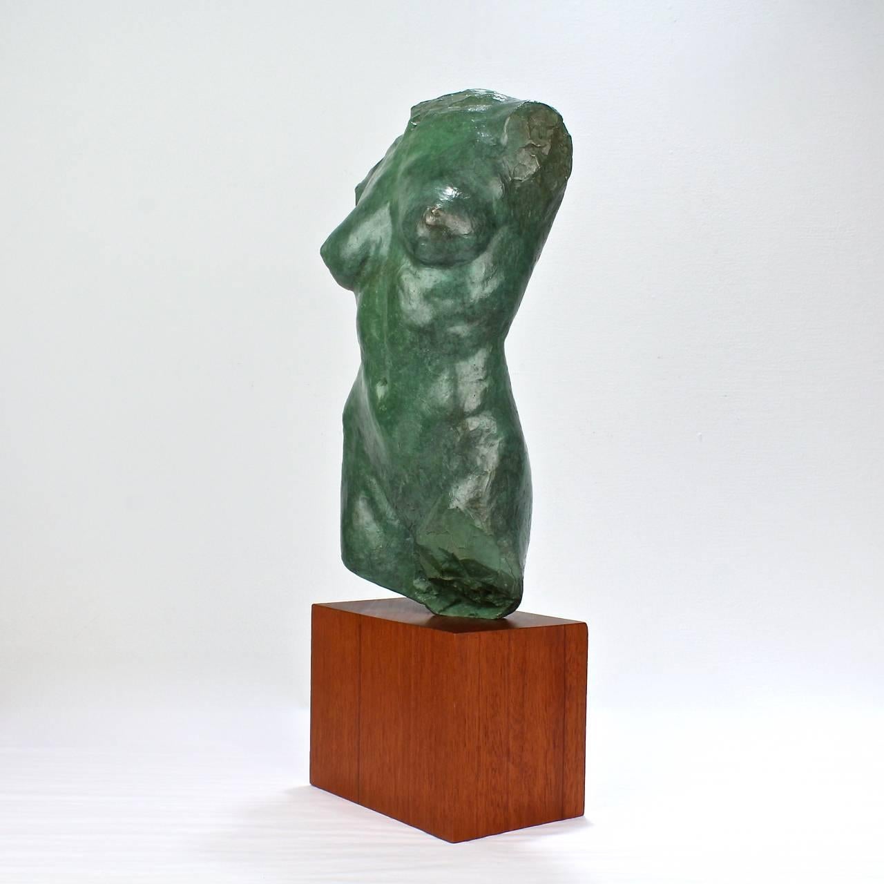 Cassiopeia

A bronze sculpture with verdigris patina of a nude female torso by Julia Levitina.

2009

Stamped with an edition number 2 of 9 and with the artist's monogram to the reverse. 

Mounted on a wooden plinth.

Height (including