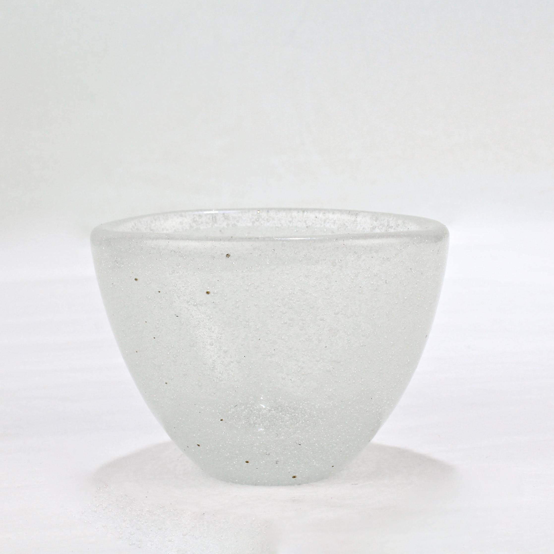 A fine, diminutive white Pulegoso vase. 

Designed by Carlo Scarpa and produced by Venini.

Base bears a two line acid etched factory mark.

Measures: Width ca. 3 1/4 in.

Items purchased from David Sterner antiques must delight you.