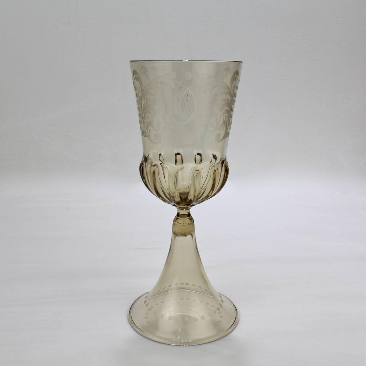 A good group of vintage Venetian glass wine or water goblets.

Each with a large cup capacity and very delicate hand feel.

Manufactured by Pauly and Co. in Venice, Italy in a light amber blown glass with a large cup with Renaissance style etching