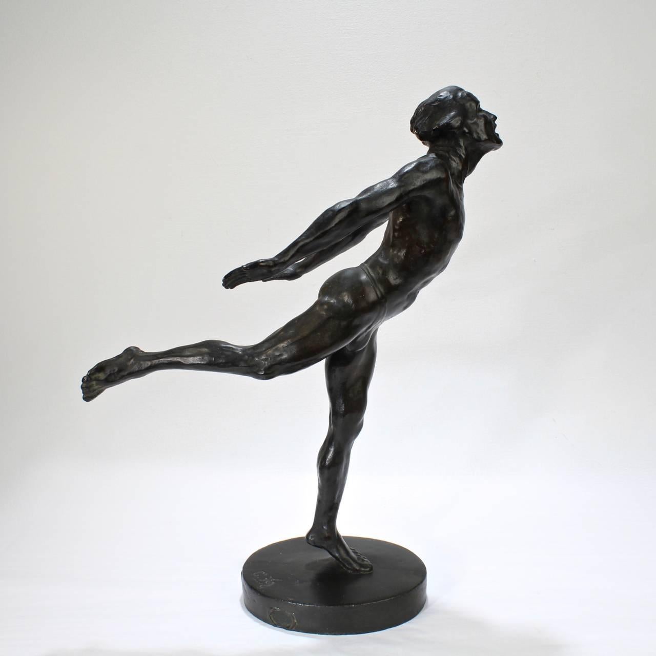 A rare and fine period French Art Deco bronze sculpture of a male dancer or ballerina (nude but for a dancer's belt). The dancer stands with outstretched arms and leg bearing a strained or yearning expression.

The bronze was cast by Arthur