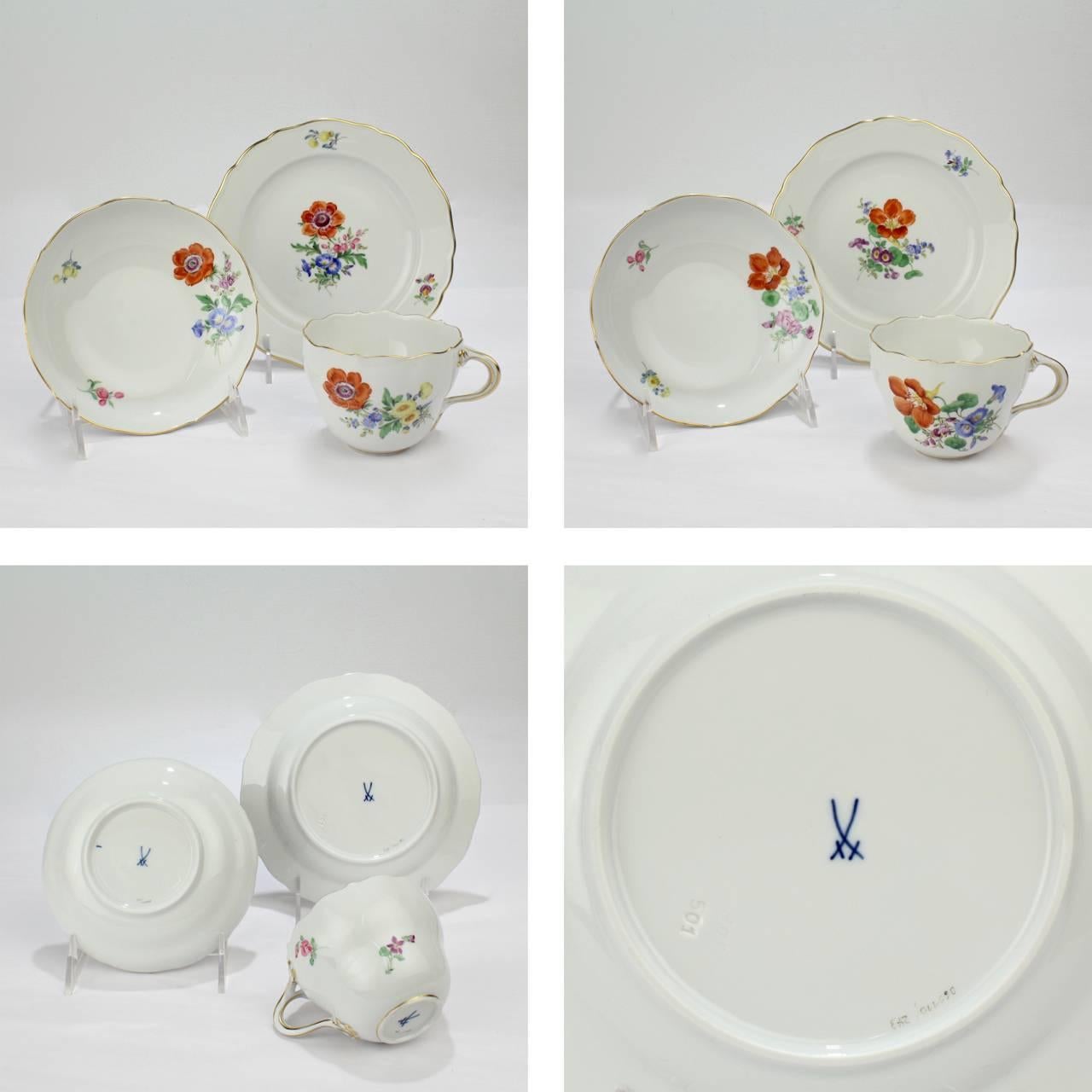 A group of six Meissen porcelain tea cup, saucer and plate trios decorated with a matching floral spray on each piece of the trio.

It is rare to find these matching trios complete (and even more rare to find a group of six).

The floral sprays