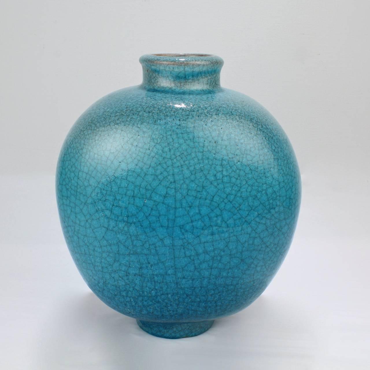 A large turquoise crackle glaze vase by Fridegart Glatzle for Karlsruhe Majolica.

Base bears a Karlsruhe factory mark / Made in Germany / SH / and a Chantal mark.

Height: circa 11 1/4 in.

Items purchased from David Sterner Antiques must