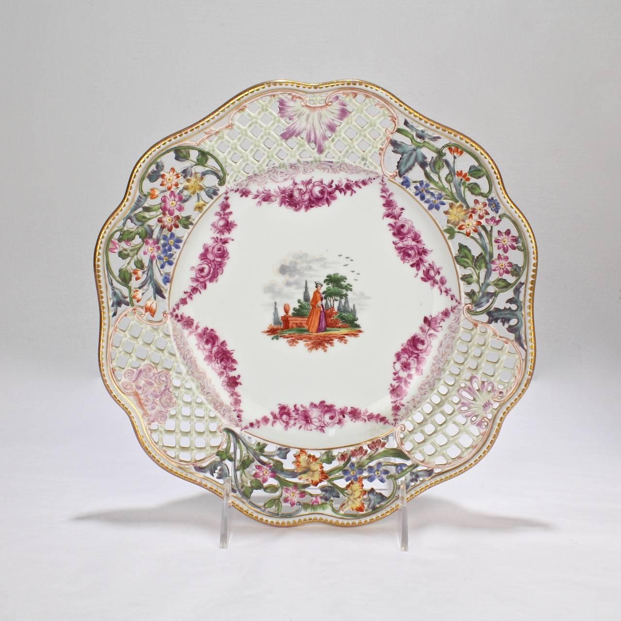 A finely worked pair of antique Dresden reticulated cabinet plates.

Each with hand-painted decoration. 

Diameter: ca. 9 1/2 in.






  