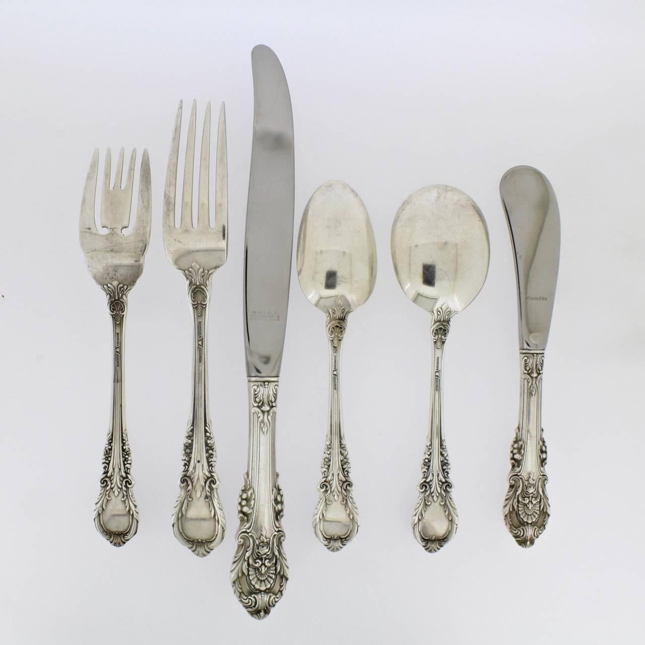 75-piece Wallace sterling silver Sir Christopher flatware set

The set includes 12 regular forks, 12 knives, 11 salad forks, 12 soup spoons, nine butter knives, 18 teaspoons, and one jelly spoon. 

The pieces are not monogrammed. 

Reverse