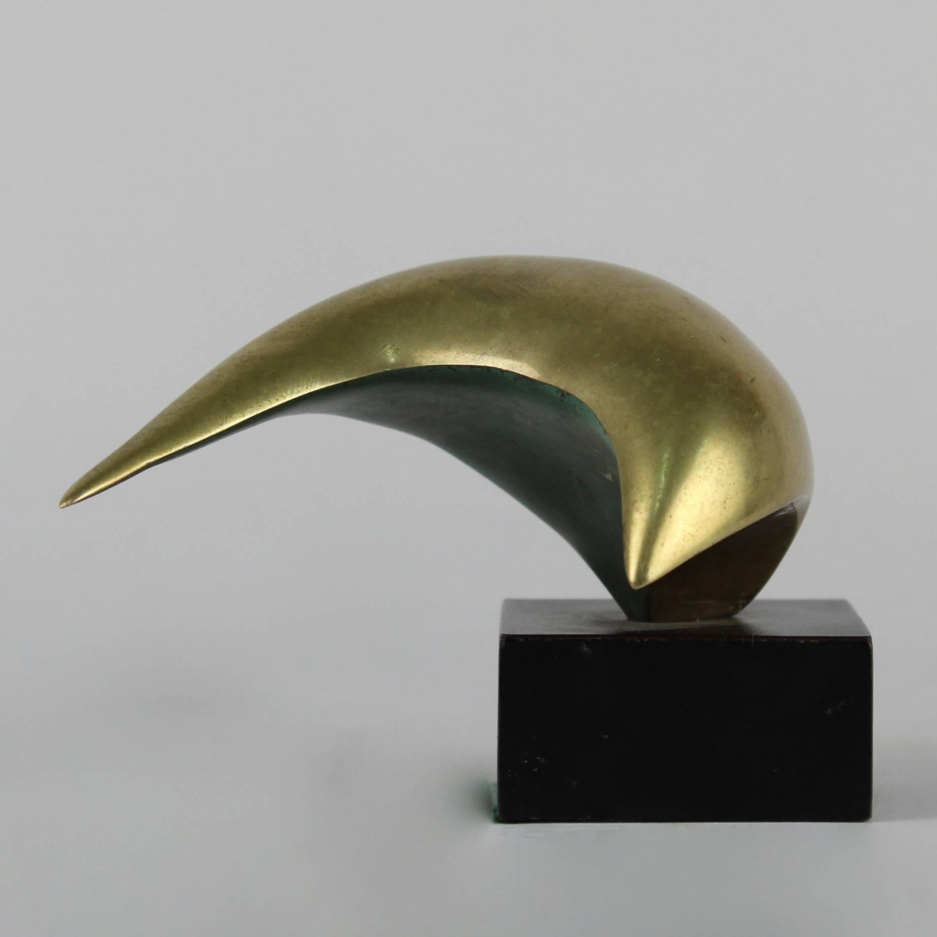Offered here for your consideration is an organic modernist gilt bronze sculpture of a stylized bird.

Additional Details:
The bronze rests on an artist-made black laminated plinth; the panels of which are slightly askew at the edges. There is wear