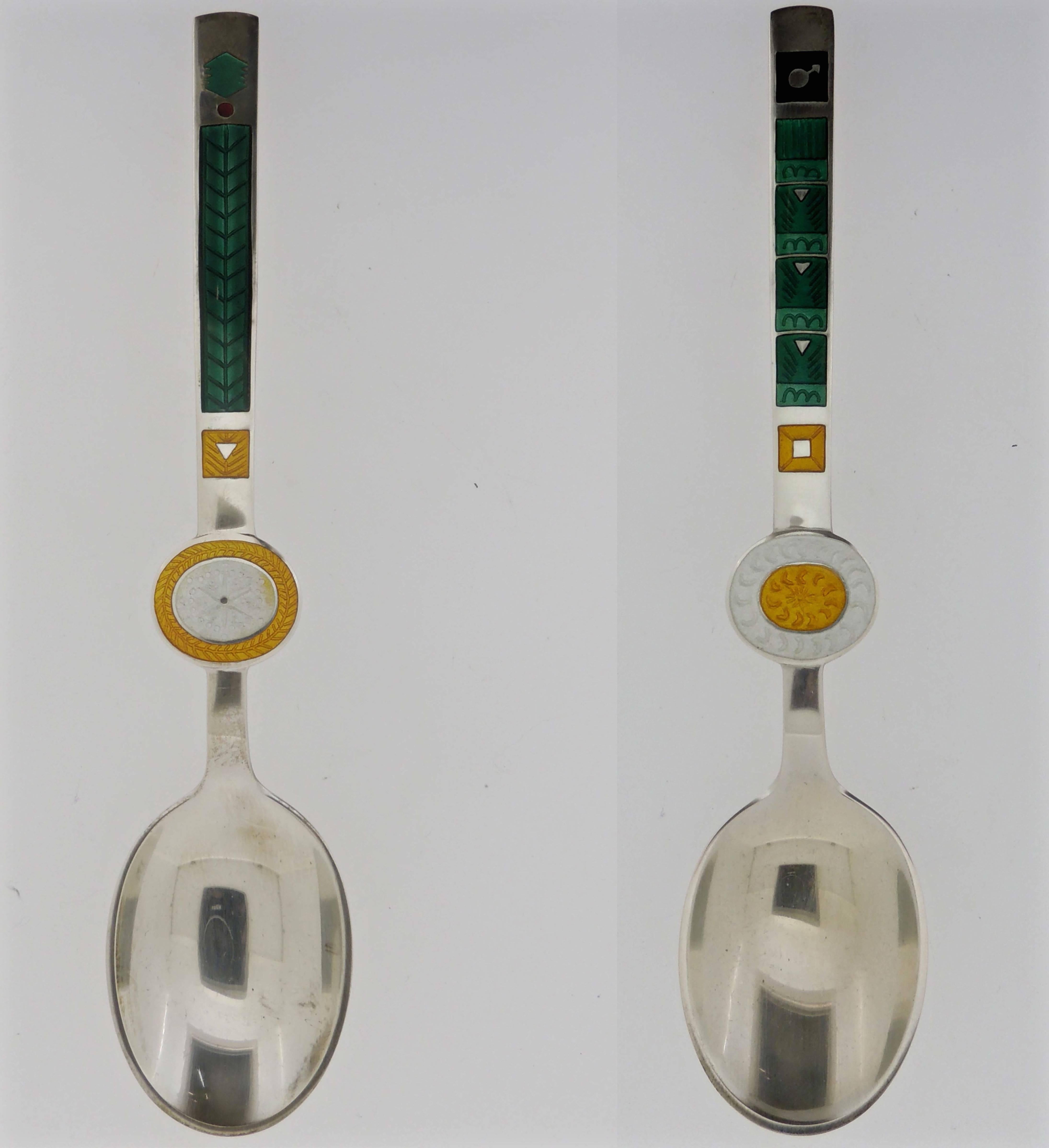 An complete set of 12 sterling silver and enamel Zodiac spoons by Paul Rene Gauguin for Anton Michelsen. Each spoon is decorated with a modernist enamel design on the front and numbered sequentially 1 through 12 on the reverse. 

Reverse marked: A.