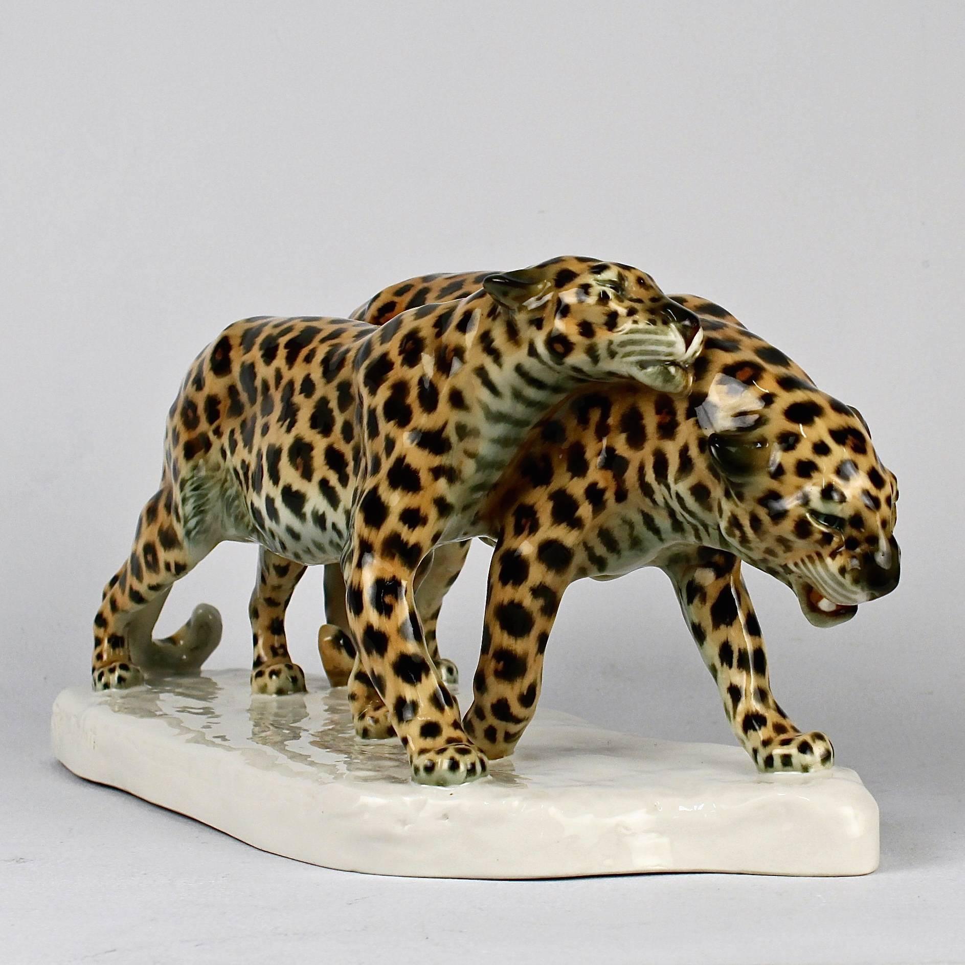 A large porcelain figurine of two leopards modeled by Etha Richter for the Schwarzburger Werkstätten für Porzellankunst with strong design elements that hint at the Art Deco movement. 

The figure was produced in 1914 and bears the factory stamp