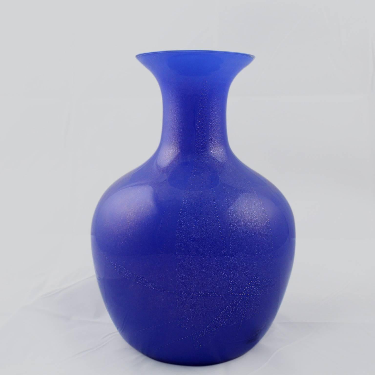 A large Vetri Murano Salviati blue glass vase with inclusions. 

The vase bears Vetri Murano and Salviati & Co. labels.

Height: circa 12.75 in. 

Items purchased from David Sterner antiques must delight you. Purchases may be returned for any