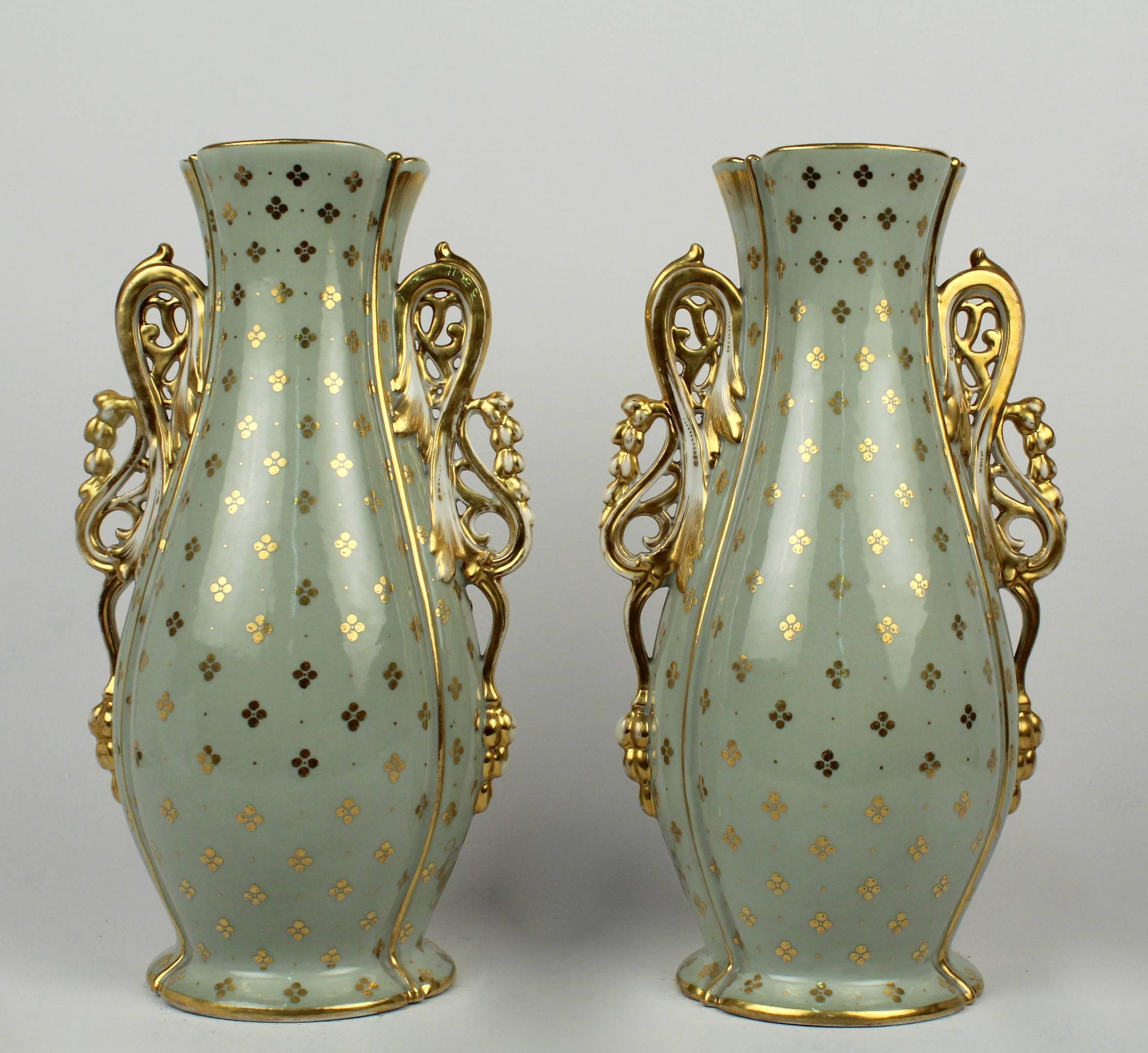 A Fine pair of 19th Century Old Paris porcelain vases. 

With central cartouches depict a hand-painted scenes with seated young maidens. 

Extensive gilding to the pale green ground.

Height: circa 13 1/4 in.

Items purchased from David Sterner