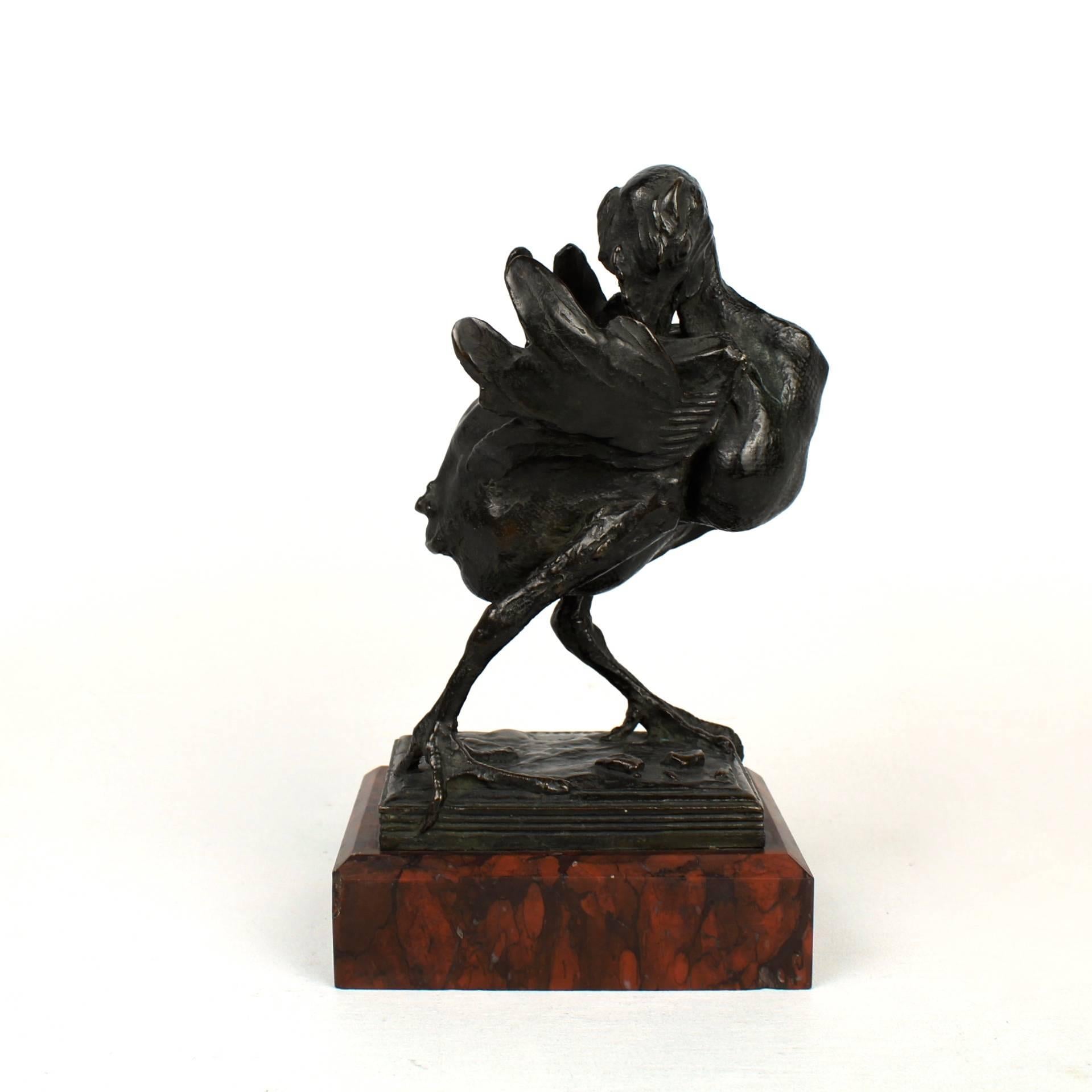 A rare model of what we believe is an adolescent turkey by the important American Animalier Sculptor, Albert Laessle. 
 
The dynamically modeled young bird is straining to scratch its back with wings outstretched and legs splayed slightly in