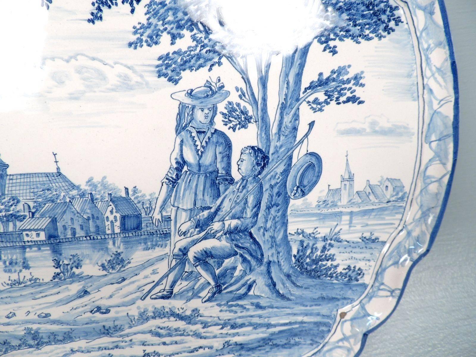 Baroque Revival Antique Blue and White Dutch Delft Wall Plaque with an Amorous Young Couple