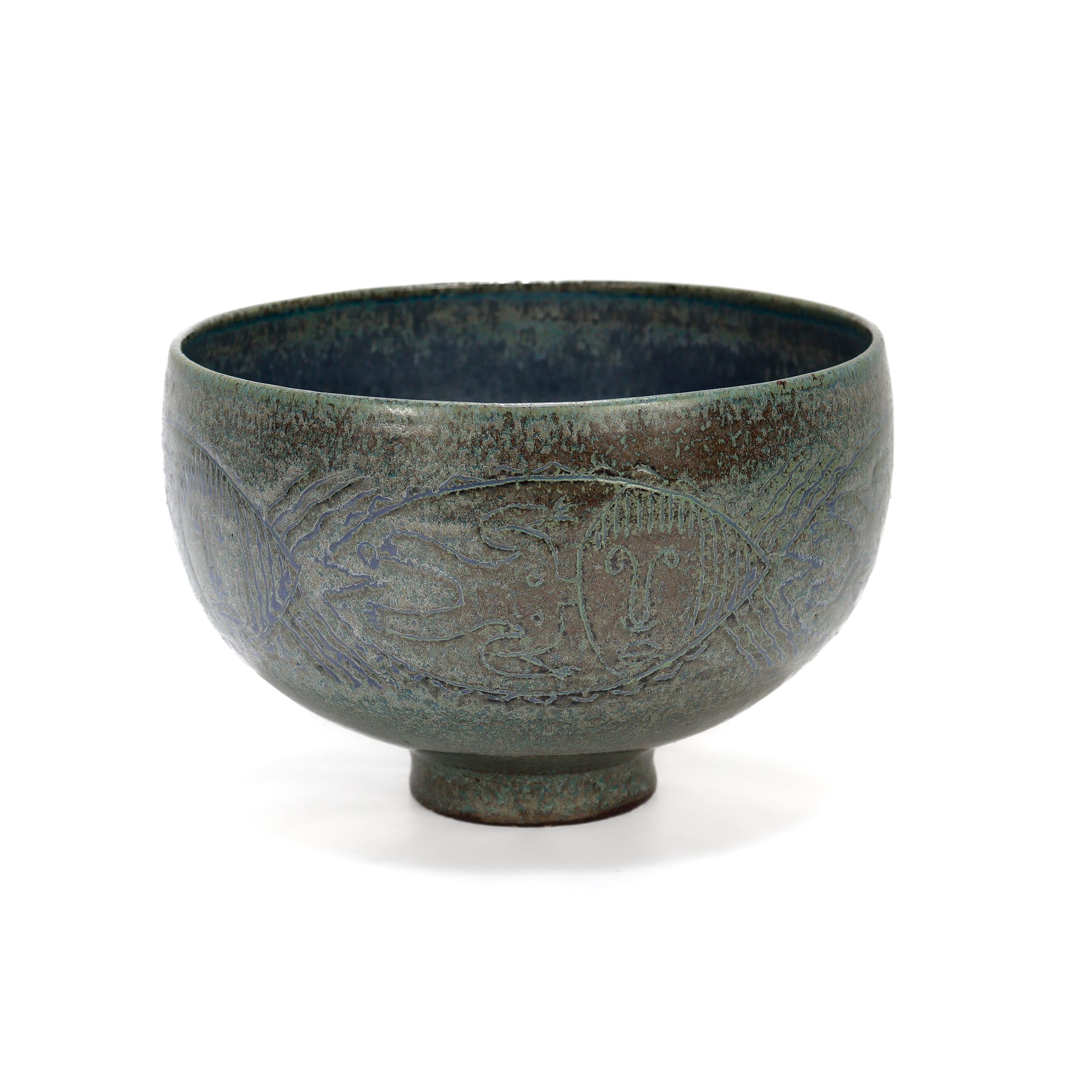 A fine Modern Art Pottery bowl.

By Edwin and Mary Scheier.

Of a circular form with tall straight sides and a small foot.  With dark cerulean glaze all over and blue/teal & brown glaze on the outside. The dark blue glaze fills in much of the