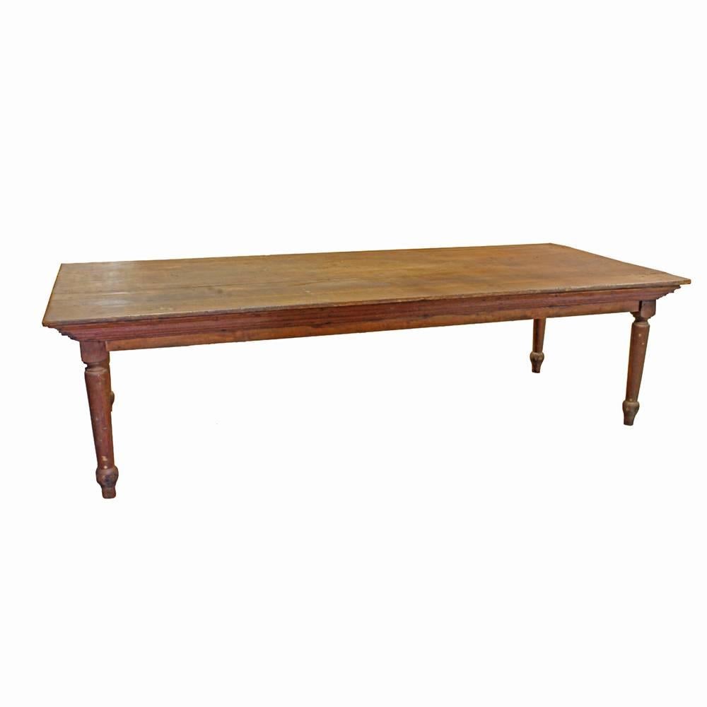A handsome solid oak table with beautiful rustic appeal and a patina that only decades of age and use can bring. Salvaged from a Vermont farmhouse, this grand and generously sized piece is the real deal.
