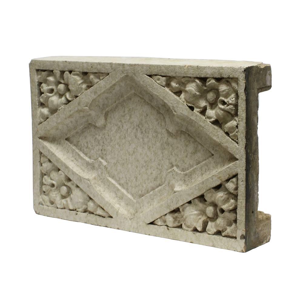 Salvaged from Salem’s no longer extant Capitol Theater, this white glazed terra cotta block is a remnant of a grand architectural facade. The theater opened in 1926 and was designed by the Portland architectural firm Tourtelotte & Hummel and