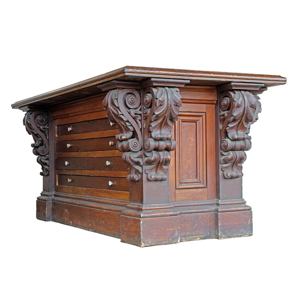 Our historical information has this piece originating at Michigan State University in the Natural Sciences department. The later 19th century vintage is evident in its solid construction and absolutely beautiful design. Heavily carved ornate corbels