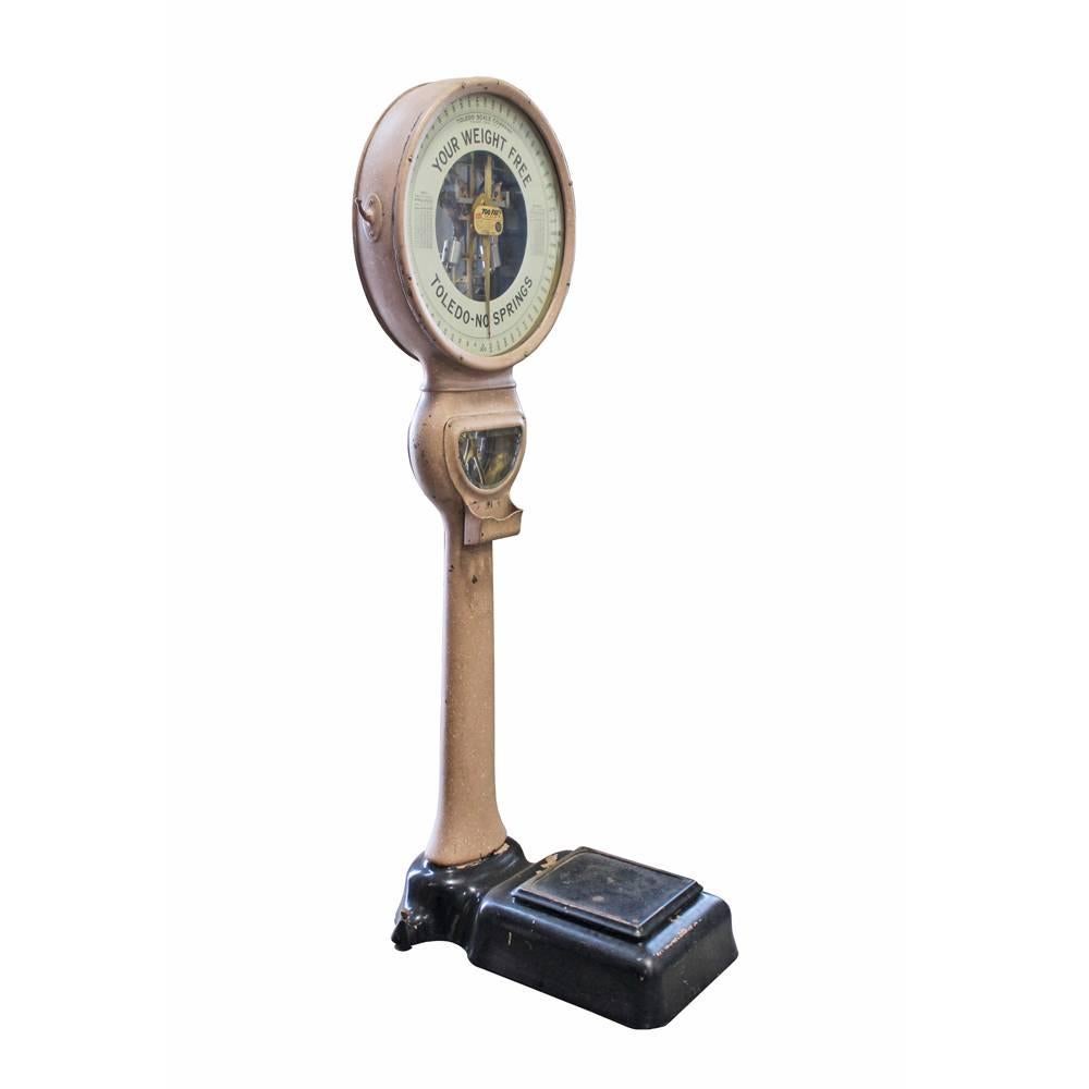 This fantastic Deco era amusement scale was manufactured by the Toledo Company. Founded in 1901, the Toledo Company initially began their business selling cash registers, eventually branching out into weights and scales. Besides its phenomenal pink