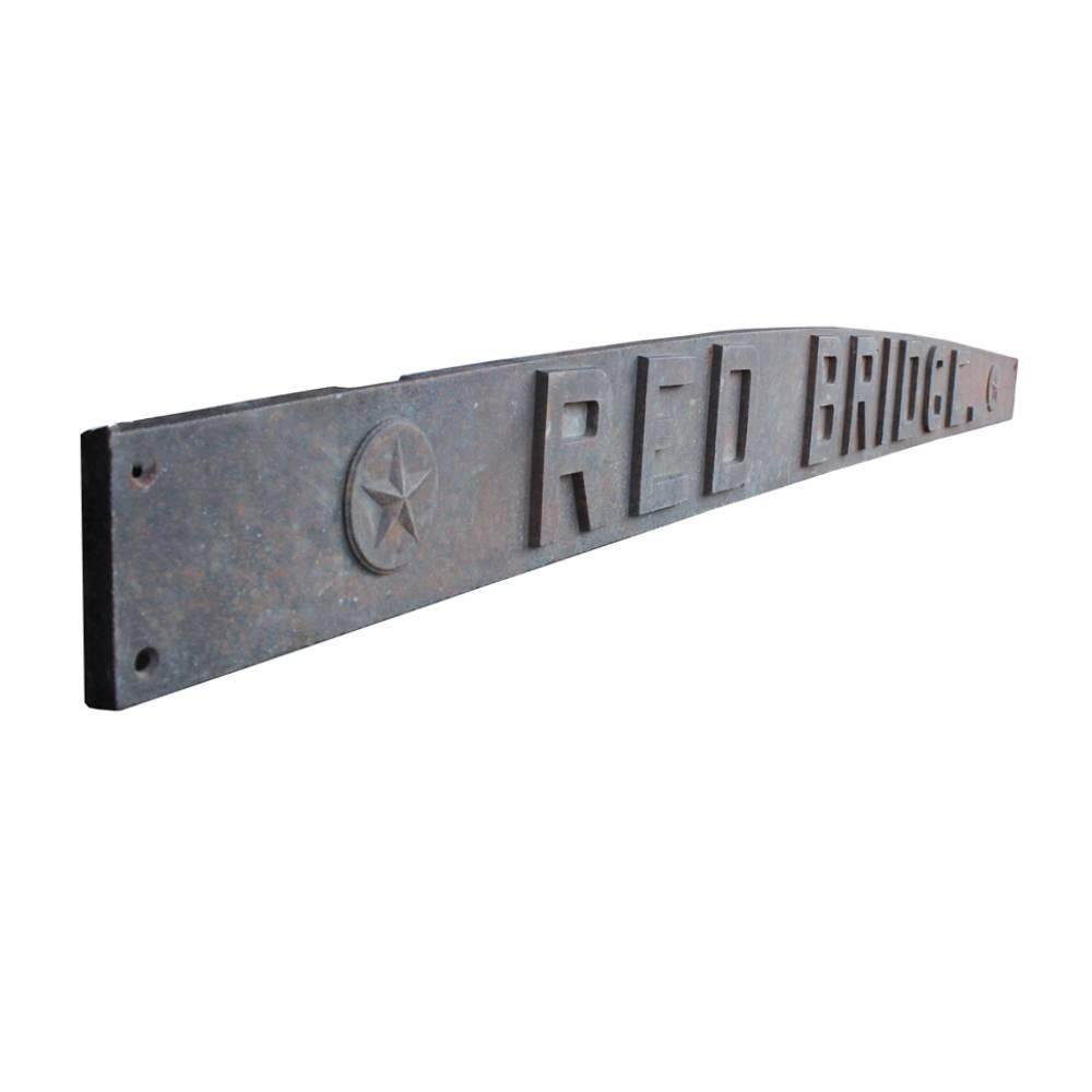 An early 20th century vintage cast iron placard, possibly used in a railroad application, bearing the name 