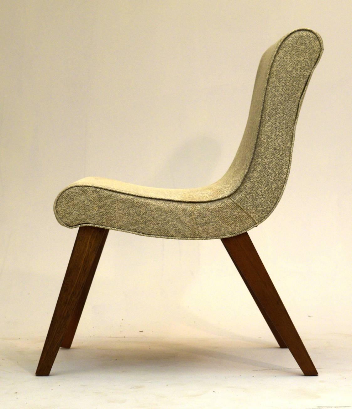 A very early chair that is attributed to Jens Risom for Knoll.

The chair features a vinyl type finish that is in good condition with a few marks and light staining. The legs have recently been re-enforced to the frame and can not be