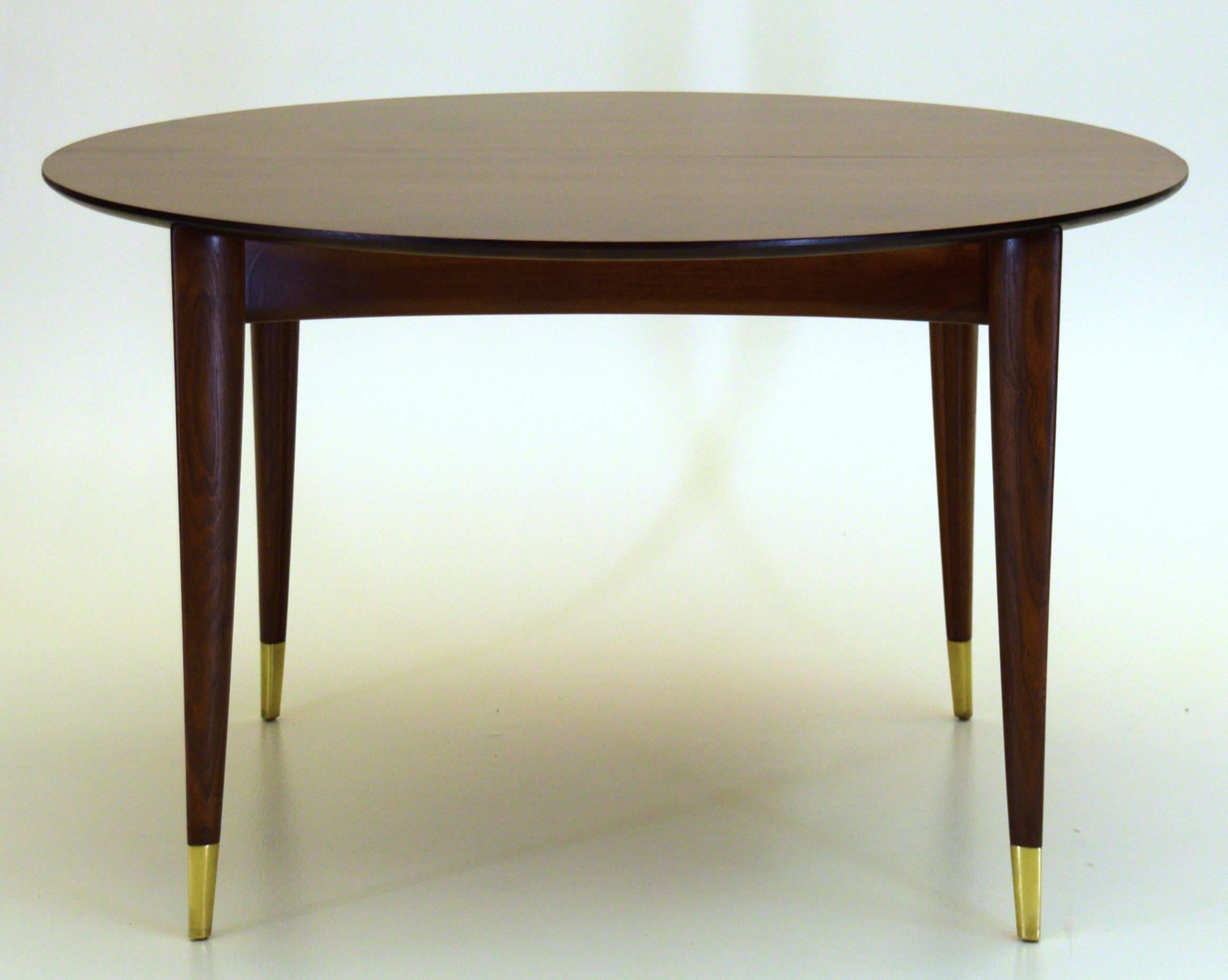 Gio Ponti dining Table.

Measures: 48" diameter and 29" tall.

Chairs available in separate listing. 

Produced in 40" and 48" presented here is the larger 48" model by Italian designer Gio Ponti, produced by M. Singer &