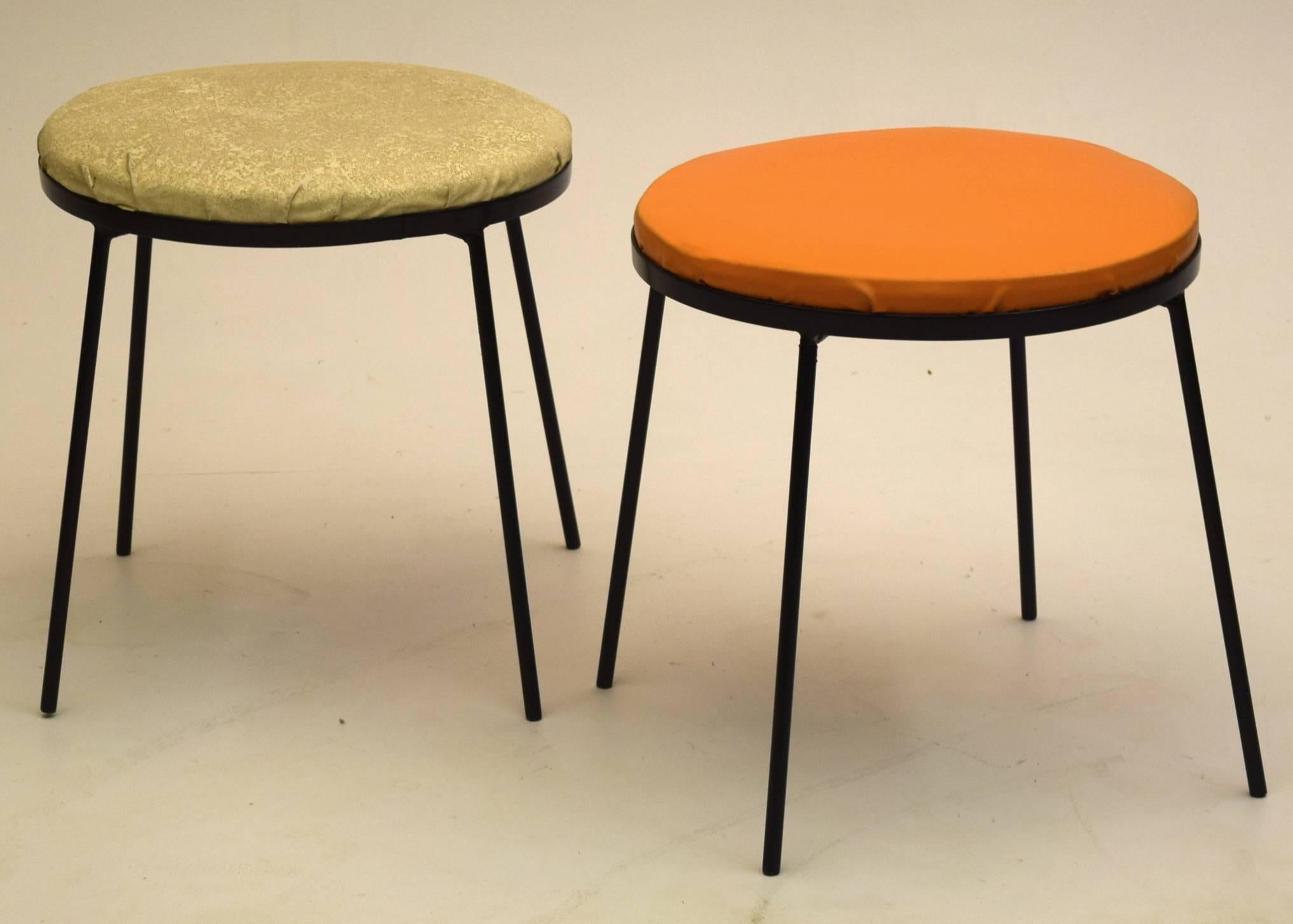 Frederic Weinberg, circa 1955.

A hard to find Minimalist round stool by Frederic Weinberg in a perfect sherbert like orange. We have two available, the other in off-white with textured pattern. Both are produced with vinyl/leatherette upon wrought