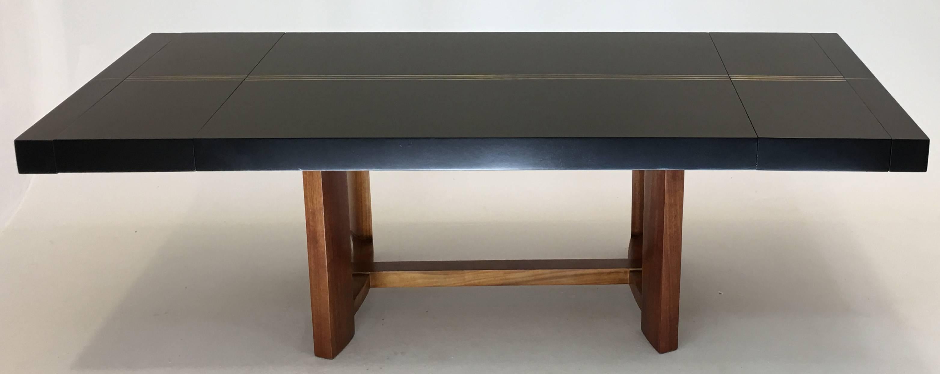 This bold and impressive vintage dining table was produced by T.H. Robsjohn-Gibbings for Widdicomb in 1951. The table is known as a 