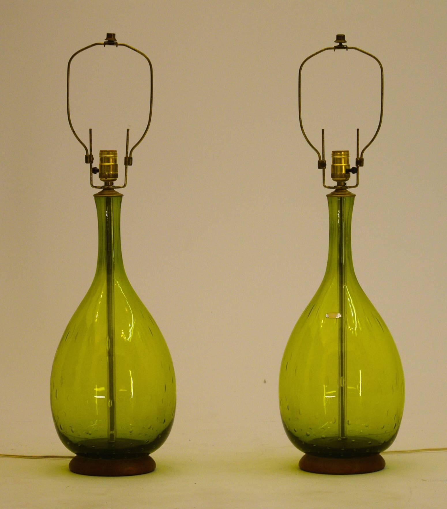 Blenko, Joel Myers
USA
1967
8.5 wide by 33 inch tall.

A pair of handblown glass Blenko table lamps designed by Joel Myers in and produced in 1967 in perfect working order. These lamps have the 