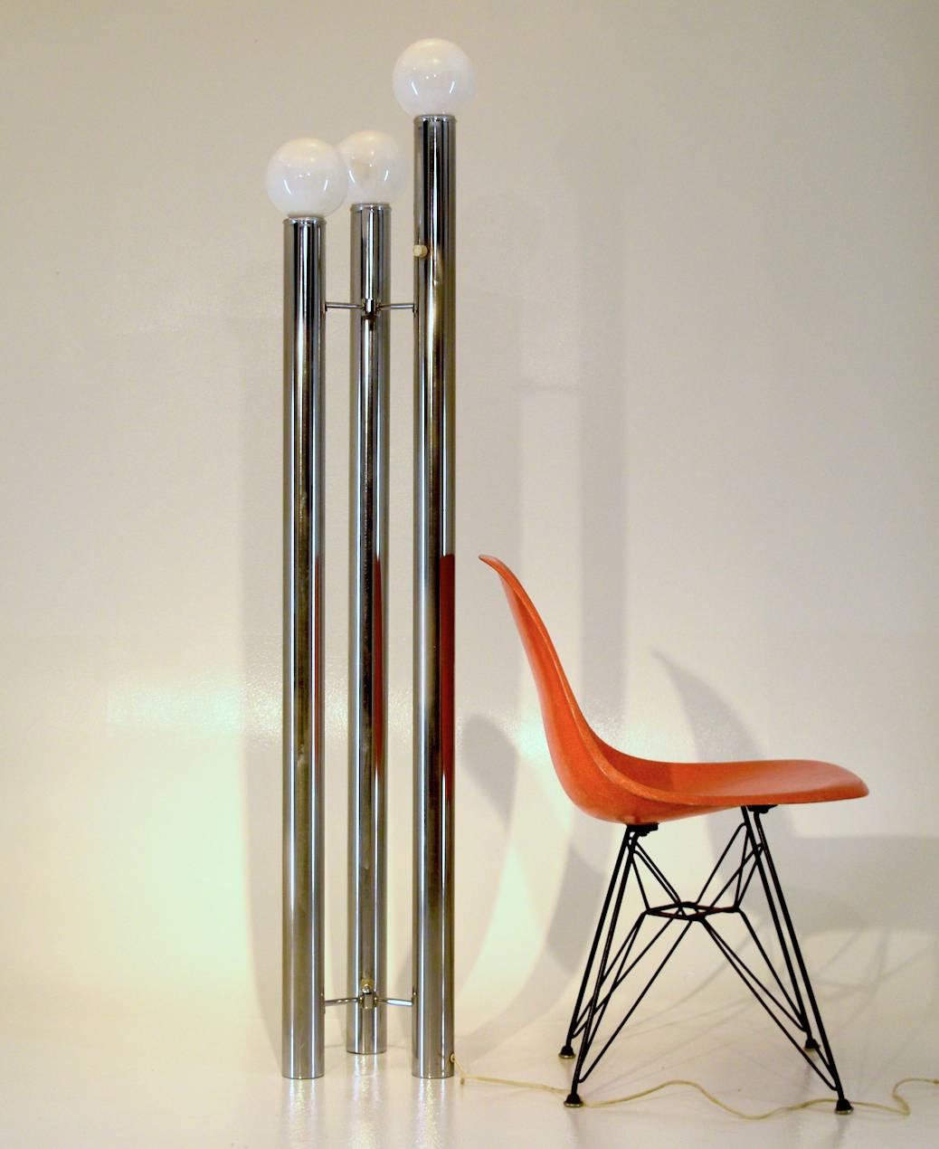 Tony Paul,
Mutual-sunset lamp manufacturing company
1972, Bellini Collection, USA
Polished steel
Measures: 60.5 tall x 11 inches wide circular measure

This skyscraper tripod floor lamp imparts an industrial lighting feel with it's raw polished