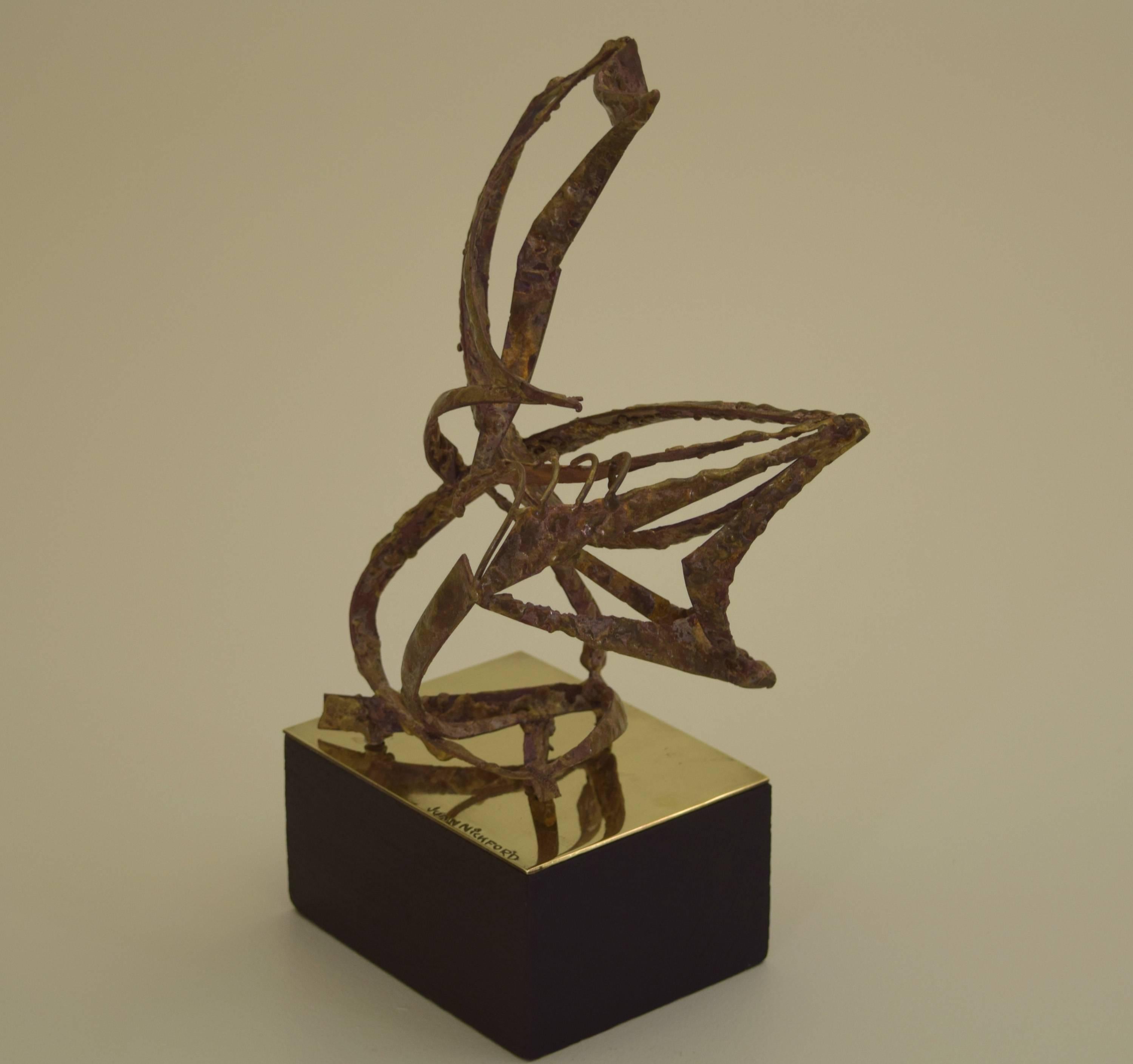 A exquisite abstract modernist sculpture by noted Cuban-American sculptor Juan Nickford (1925-2001). The piece was executed as scale model prototype for a large architectural steel sculpture commissioned and installed at Lido Beach on Long Island in