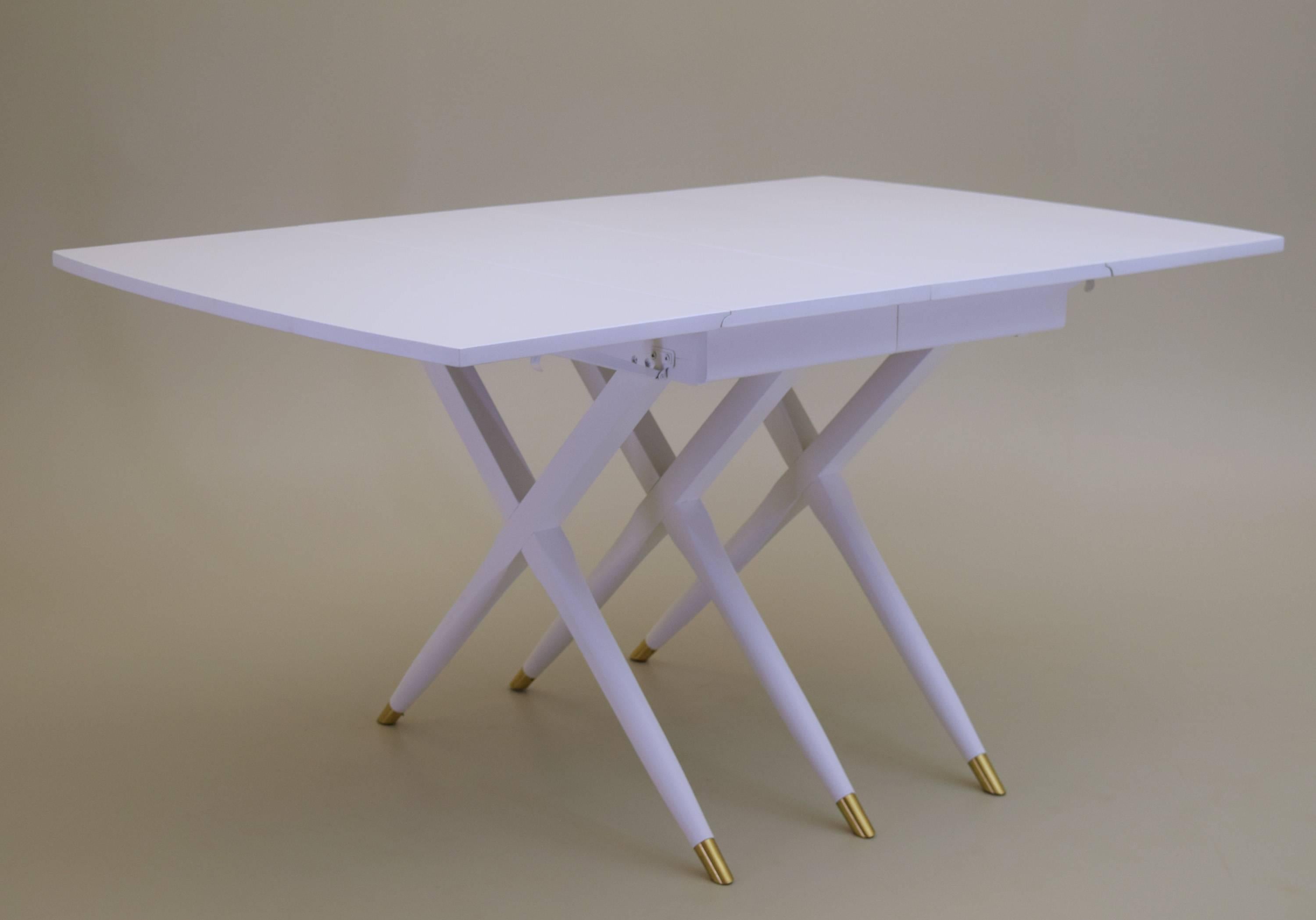 A rare custom solid wood table in beautiful white lacquer produced by Craddock Furniture  in 1955. This modernist table design was part of the 