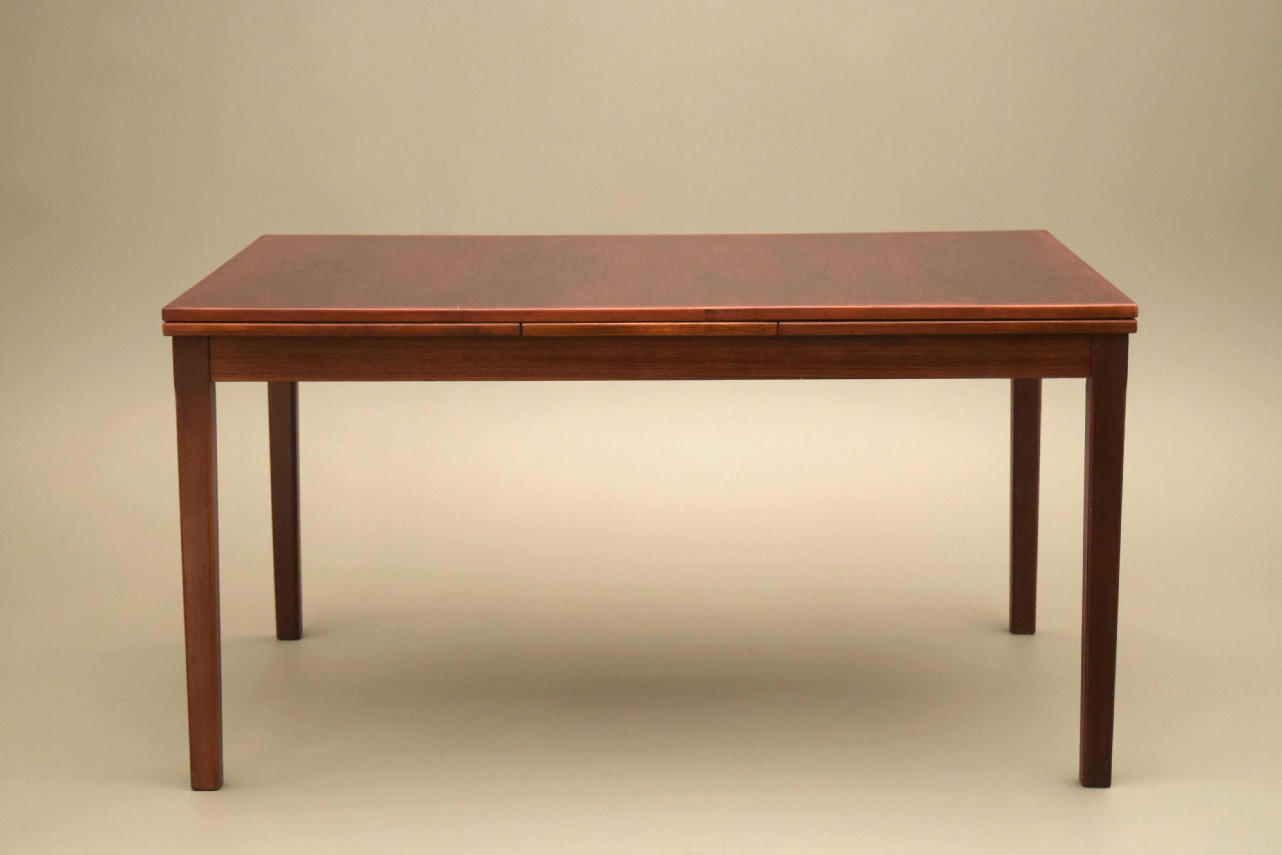 Gorgeous rosewood Danish Modern dining table by Willy Sigh of H. Sigh & Sons of Denmark in 1961, fully marked and signed. 

This beautiful dining table features the finest quality Danish workmanship throughout.  Seats up to eight comfortable when
