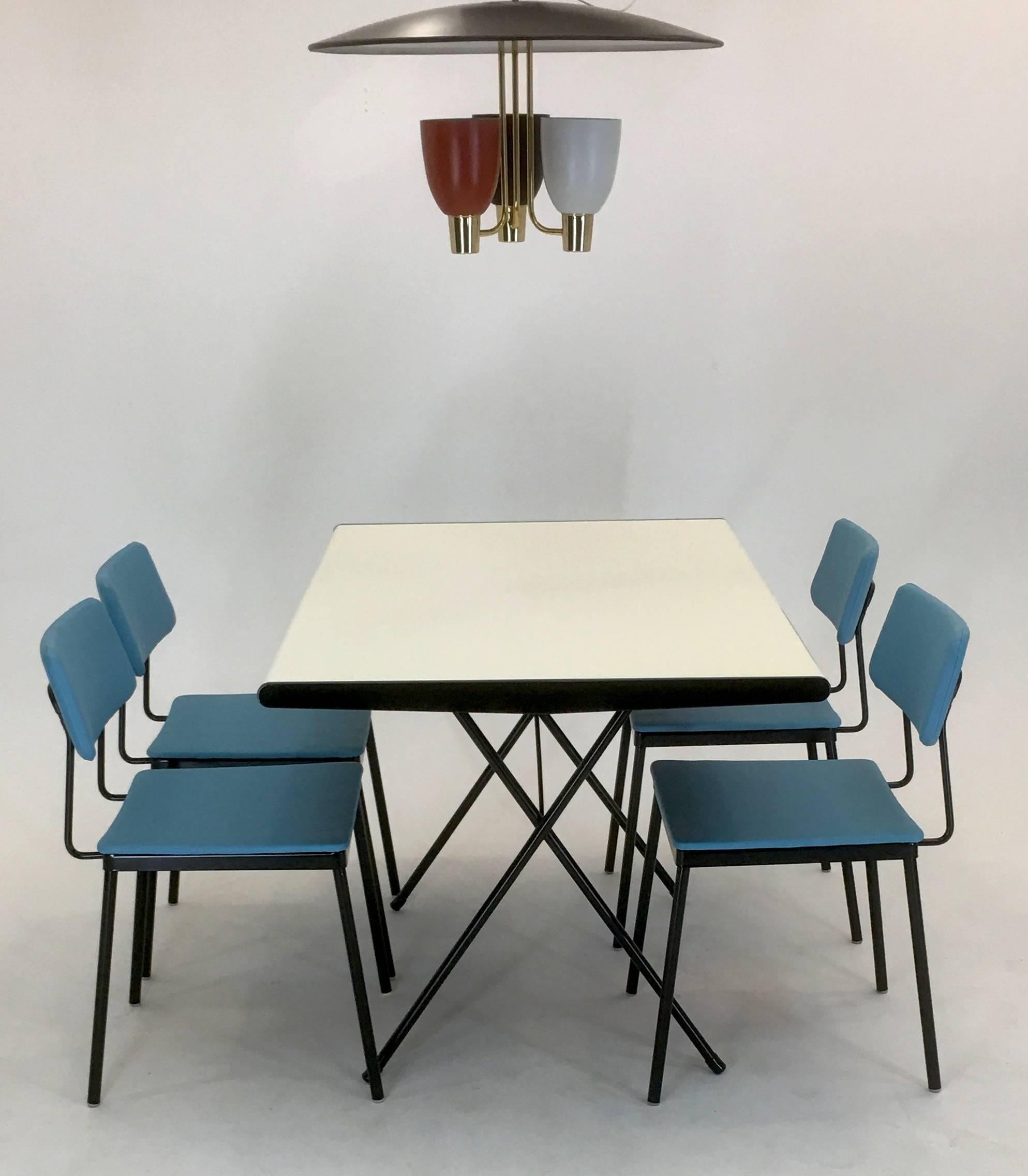 Very hard to find stellar dinette set designed by the famed Raymond Loewy for Arvin of Columbus, Indiana in 1953. Known as the Princess Line it has a thin profile in all components for a clean minimalist look and was the flagship set in