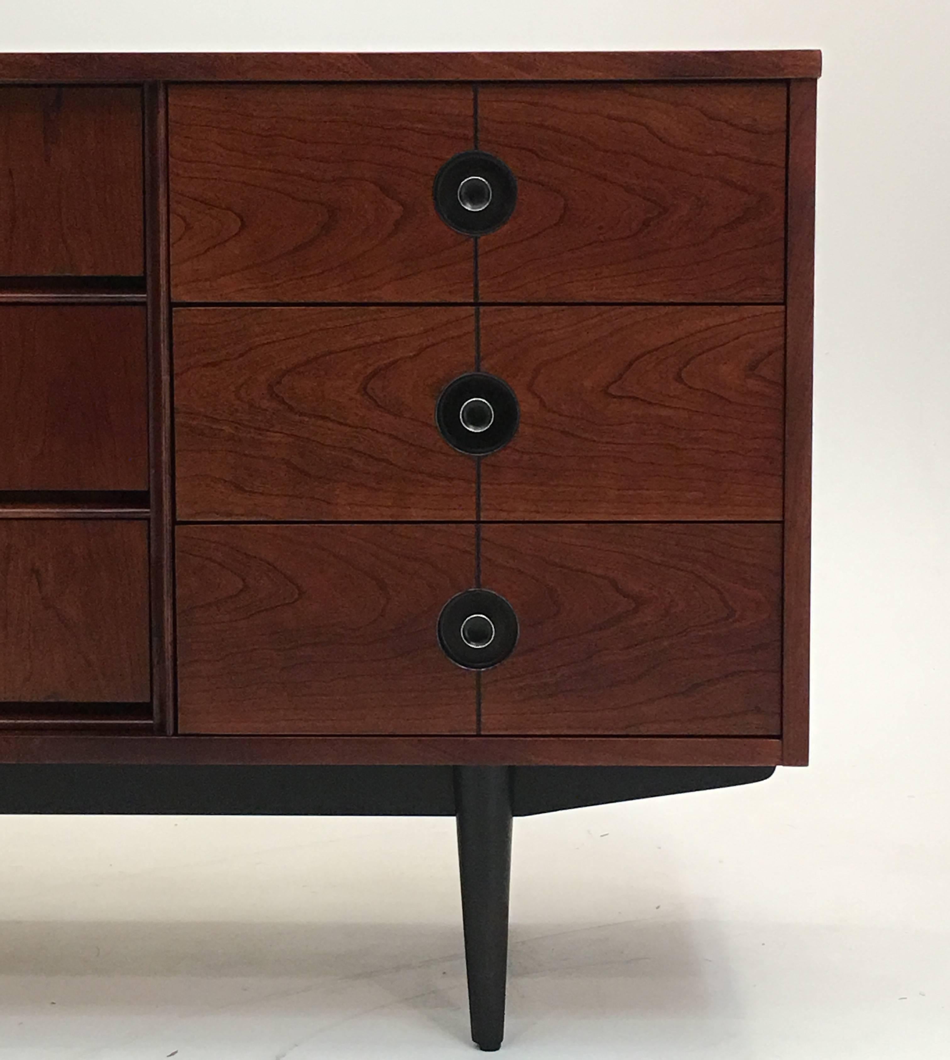 Distinctive Furniture by Stanley; the Finnline Series, triple dresser.

A gentlemen's chest is also on offer in our other listings for those seeking a matched bedroom suite. Exceptional and fine cherry has been used coupled with ebony lines and