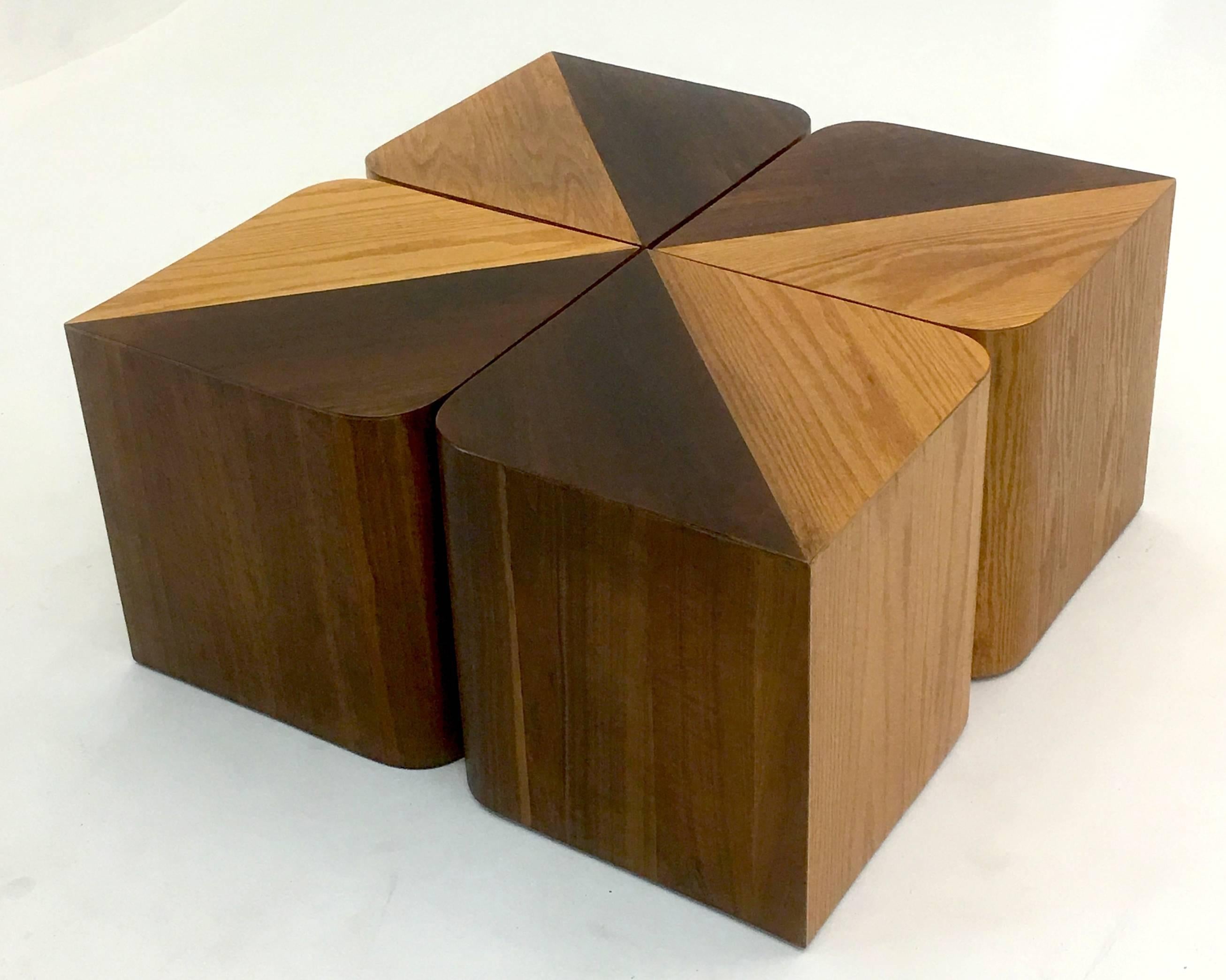 Produced by Habitat and designed by Paul Mayen, this four leaf clover designed styled coffee table is comprised of four modular sectional cubes in contrasting two tone ash and walnut wood. The modular nature allows multiple configurations for use as