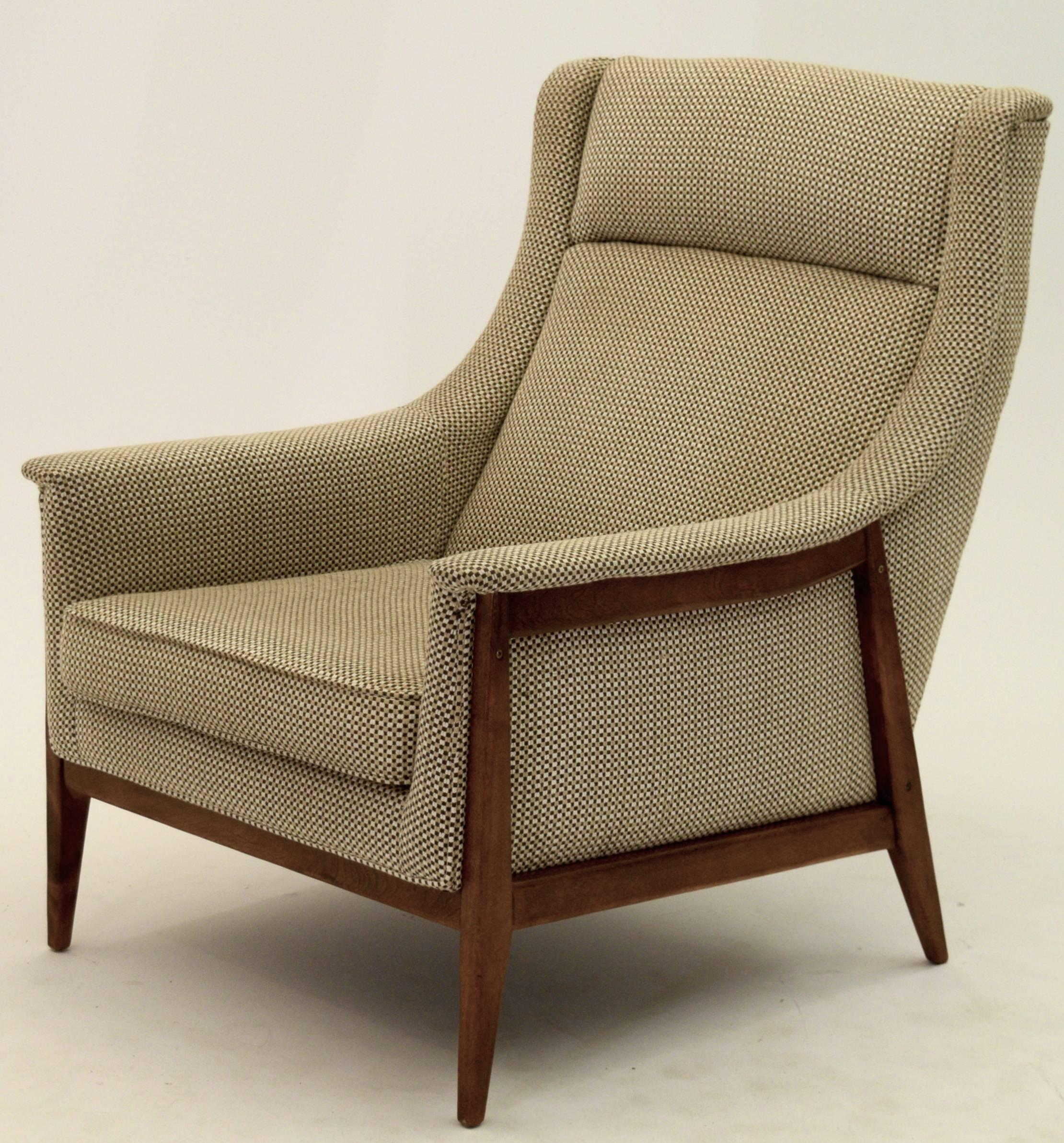 A very large lounge chair and ottoman by Selig, from their 