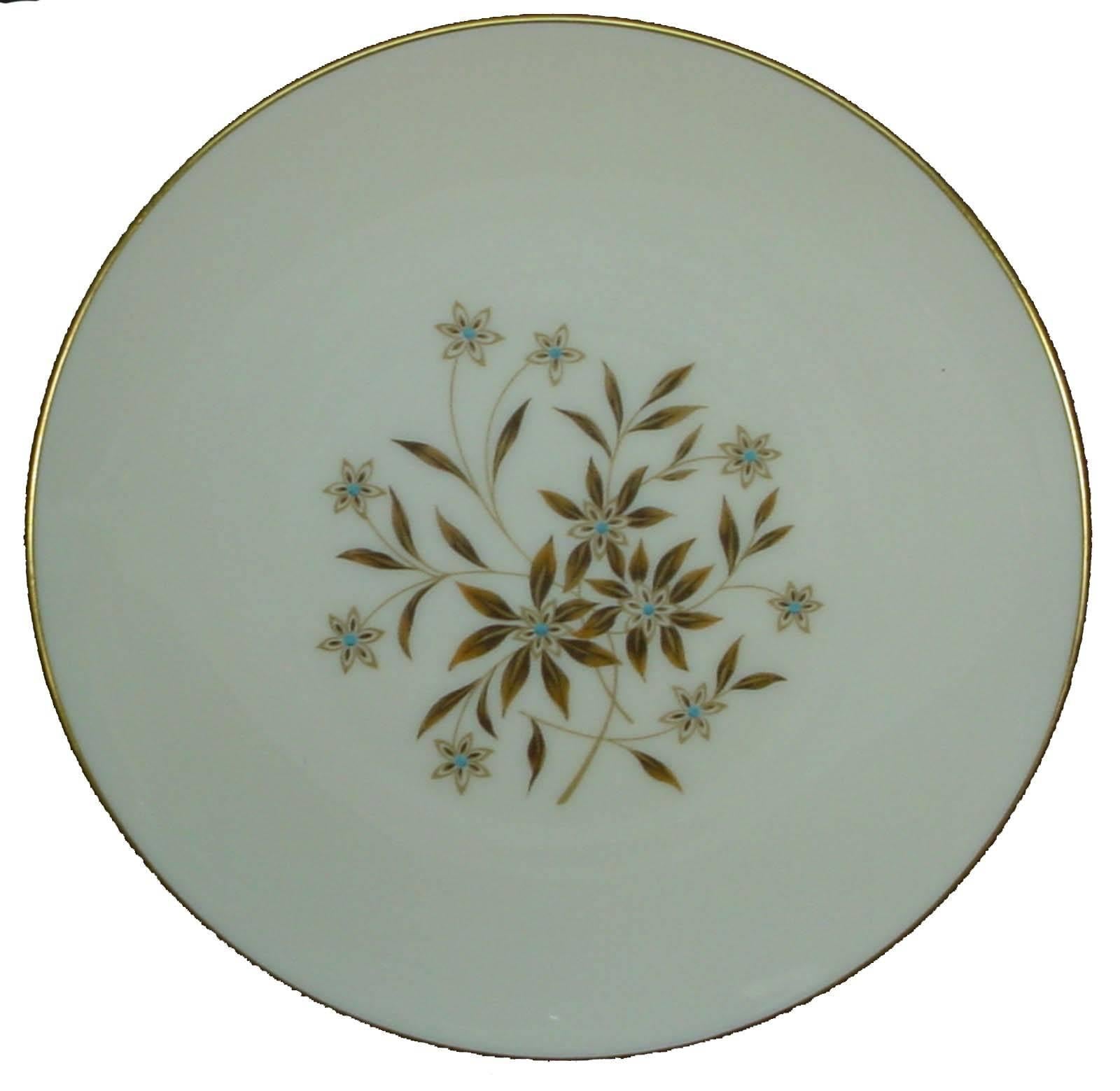 Lenox china starlight X302 pattern 60- piece set service for twelve

in great condition free from chips, cracks, break, stain, or discoloration and with only a minimum of use.

Produced from 1952-1978. 

Brown flowers with blue
