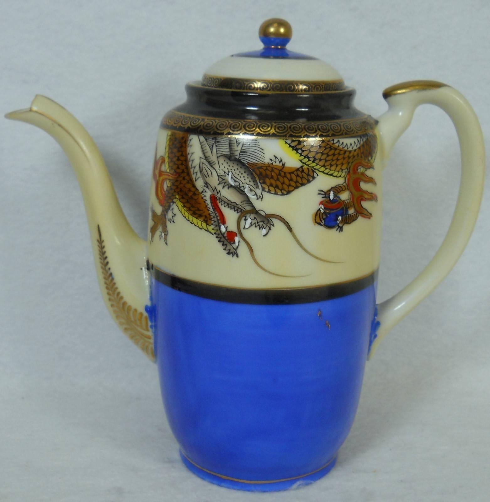 Made in Japan China Dragonware dragon ware 17-piece mini or demitasse coffee or chocolate set,

in great condition free-from chips, cracks, breaks, stains, or discoloration and with only a minimum of use.

Embossed Dragon - Blue