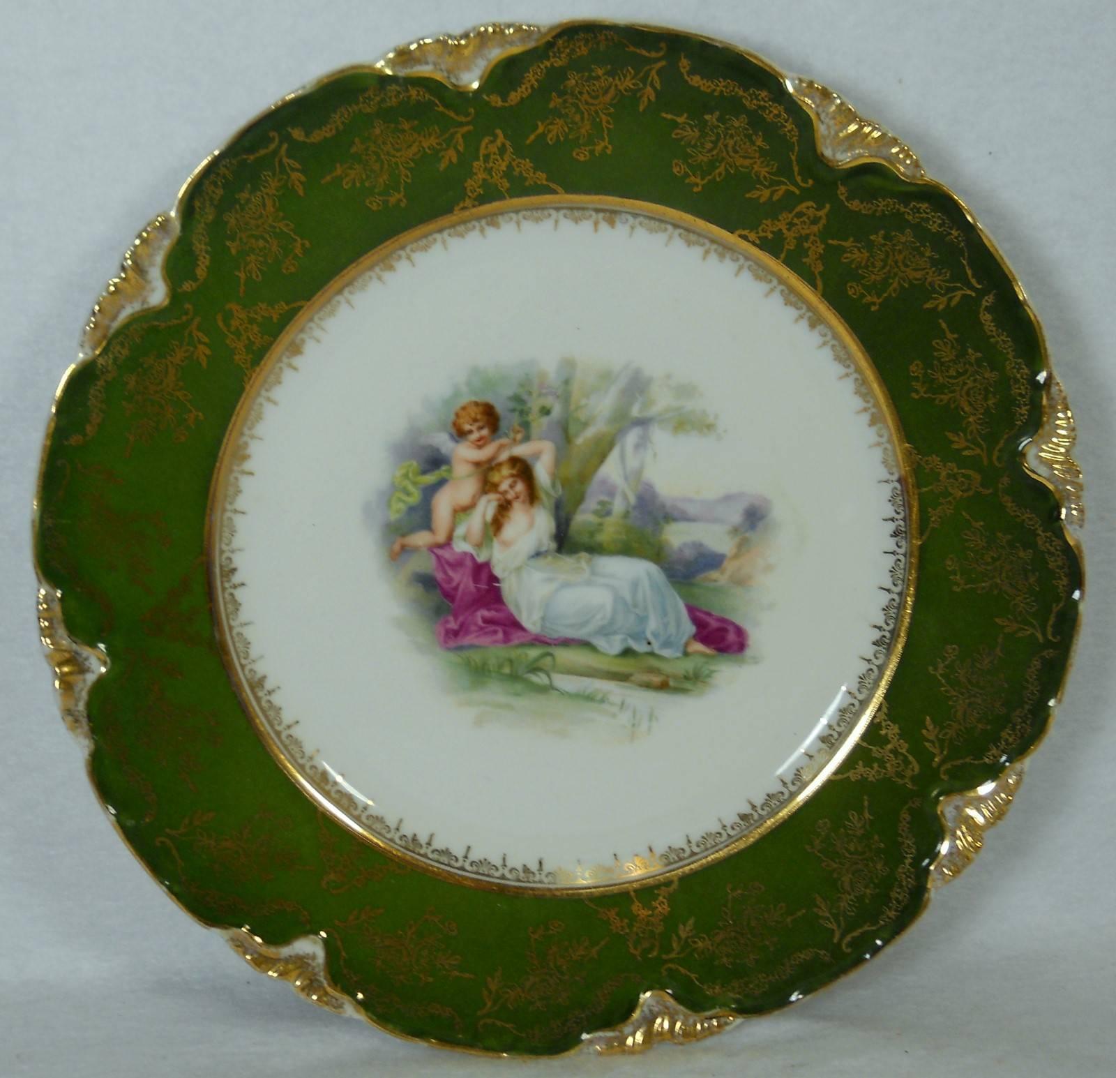 Lewis strauss & Sons Austria Classic scenes, women pattern set of twelve (12) dinner plates.

In great condition free from chips, cracks, break, stain, or discoloration. Some pieces show manor wear and or scratching.

Three sets of four