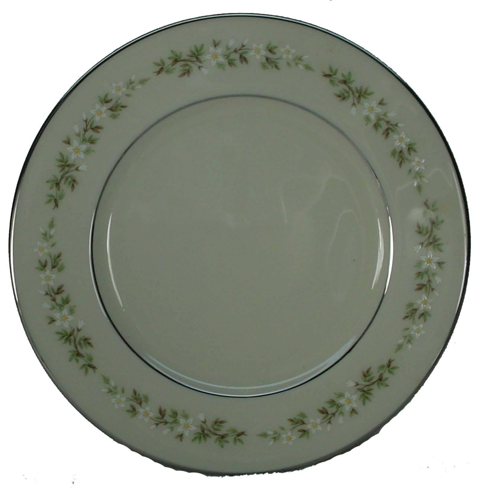 Lenox china Brookdale pattern 58-piece set service for 12,

in great condition free from chips, cracks, break, stain, or discoloration and with only a minimum of use.

Mfg 1963-1993.

White flowers with blue leaves.

Dimension