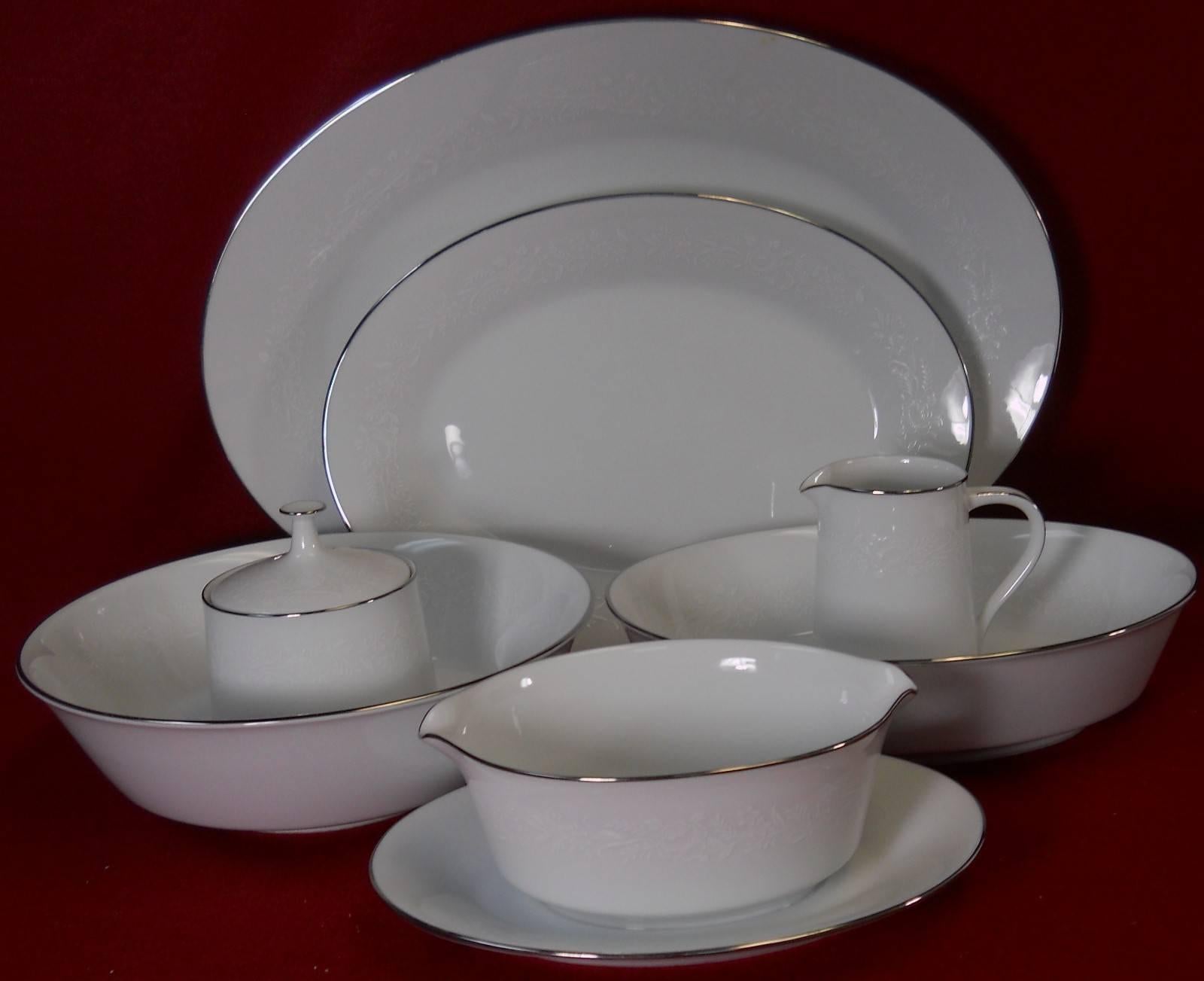 Noritake China Reina 6450Q pattern 104-piece set service for 12.

In great condition free from chips, cracks, break, stain, or discoloration and with only a minimum of use. 

Production dates 1963-1983. 

Includes 18 cups, 18 saucers, 12